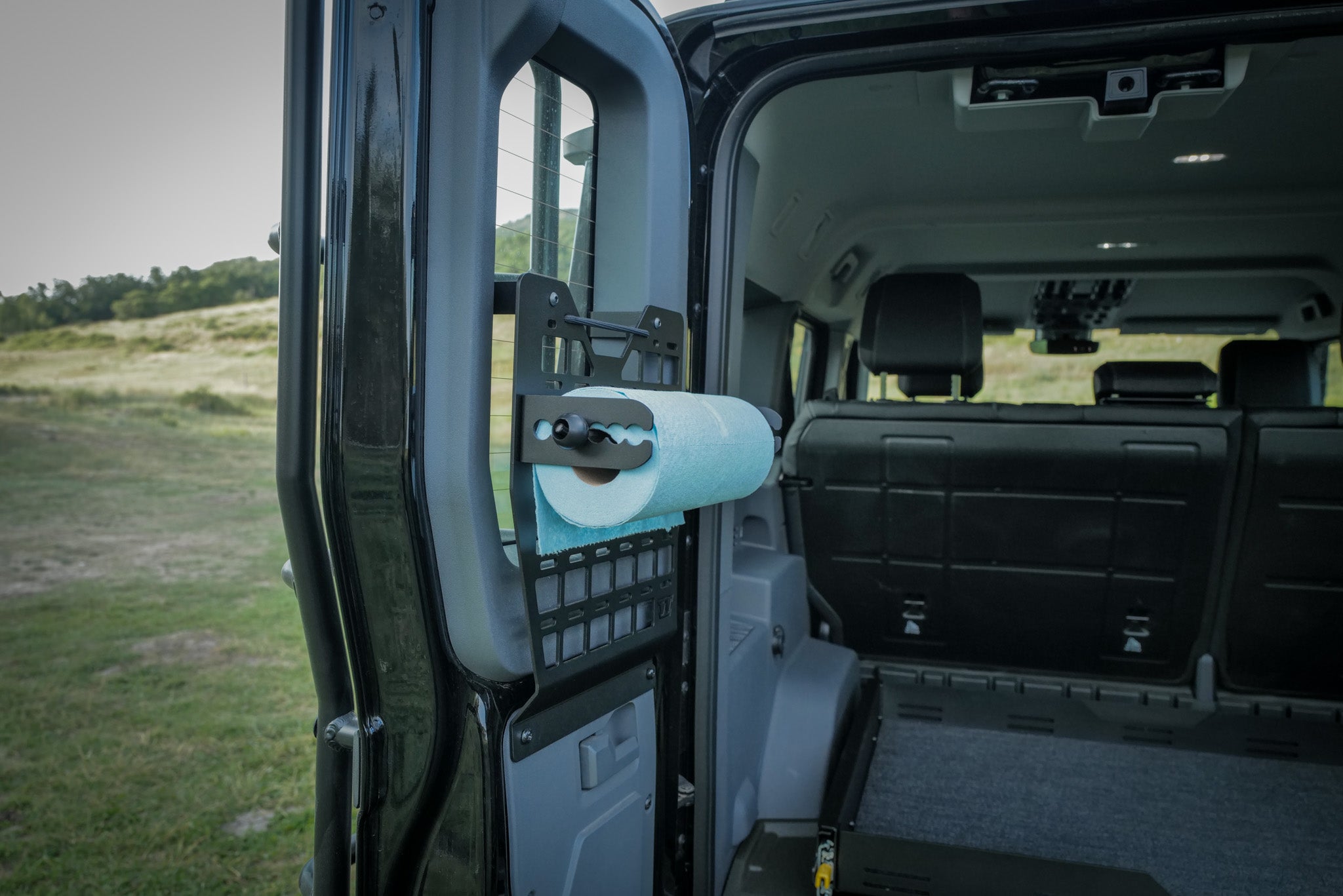 Grenadier rear door molle panel with behind panel gear storage