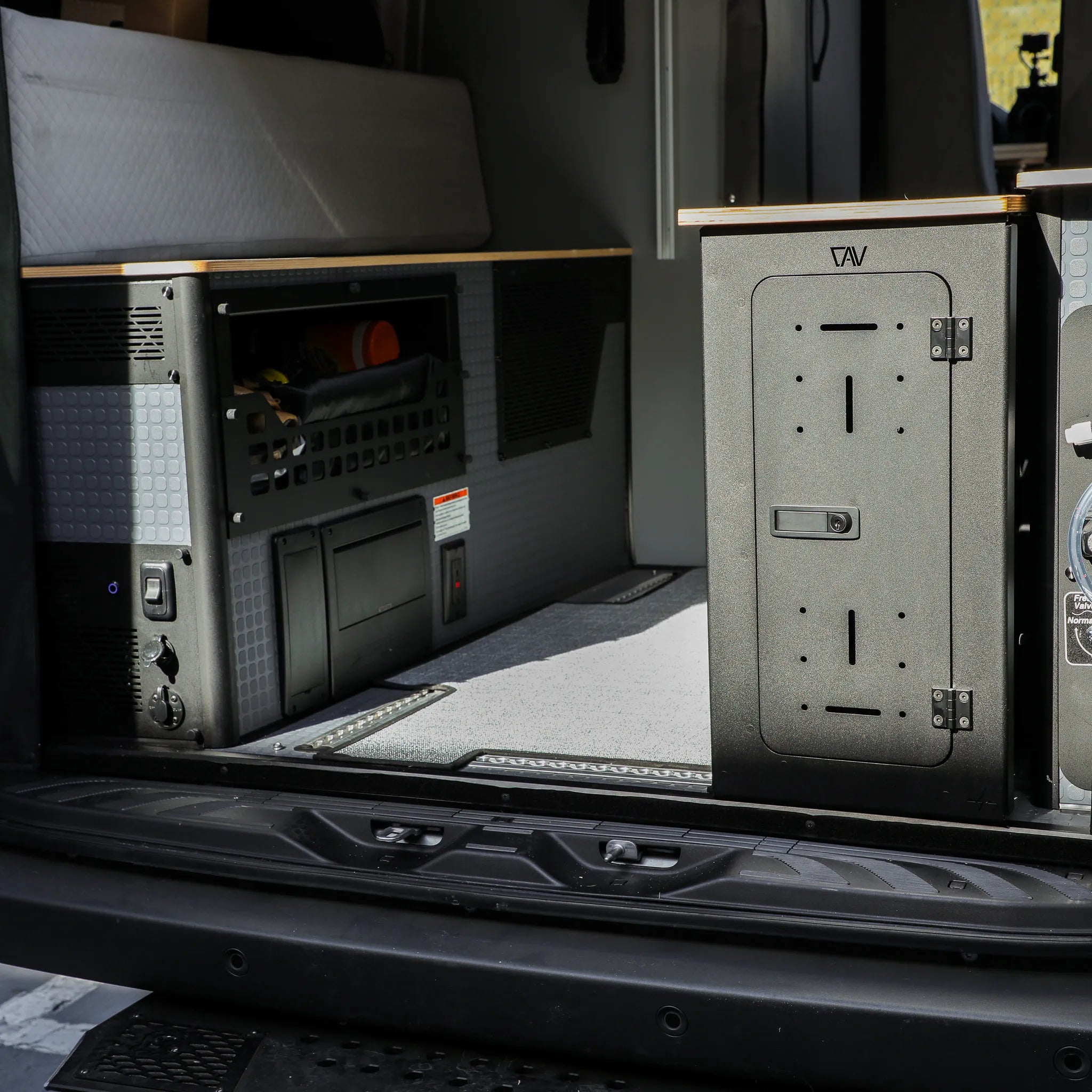 GLSS Passenger PRO system with integrated desk and H2O box inside 2025 Revel van