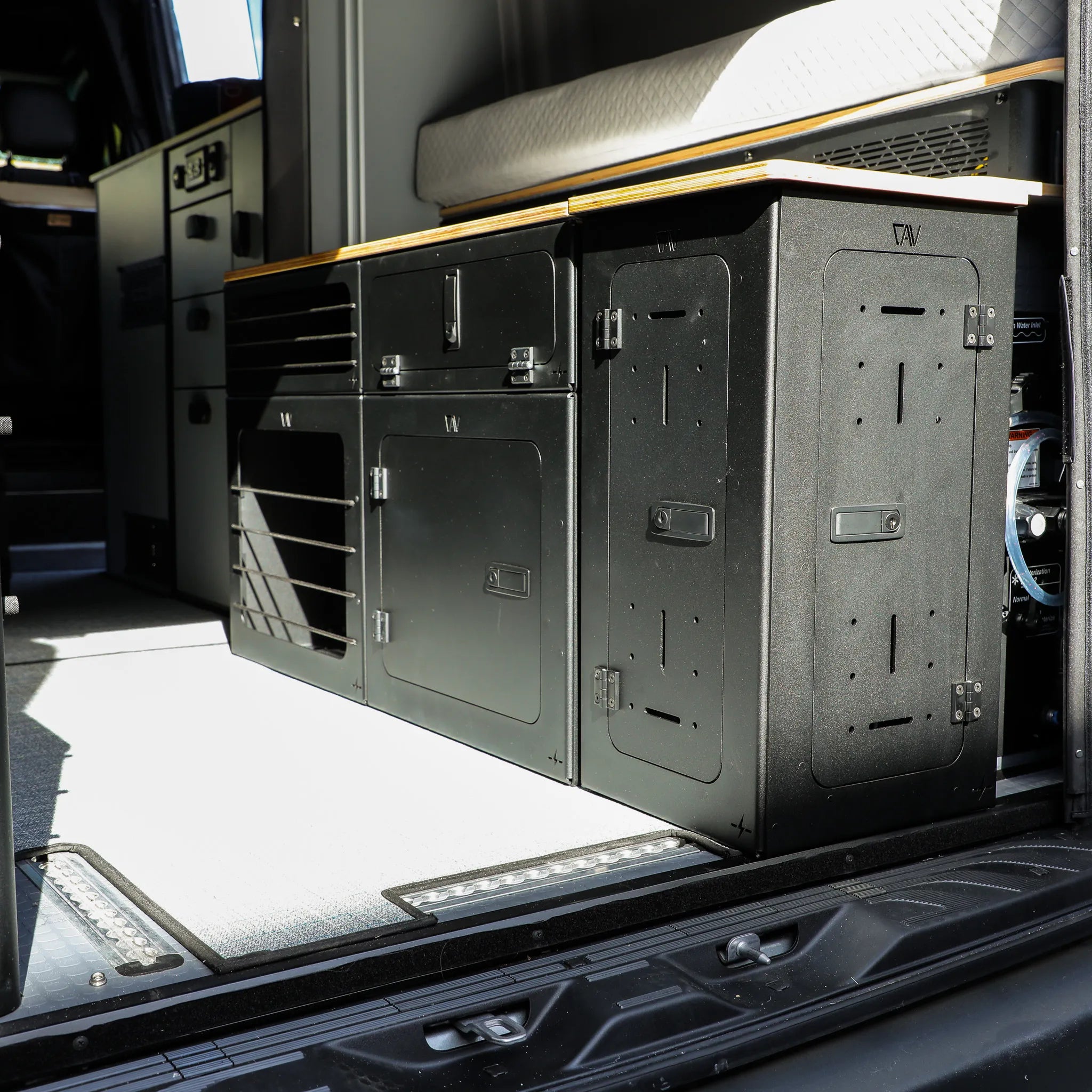 GLSS Passenger PRO with desk and H2O Box installed in van interior for 2025 Revel.