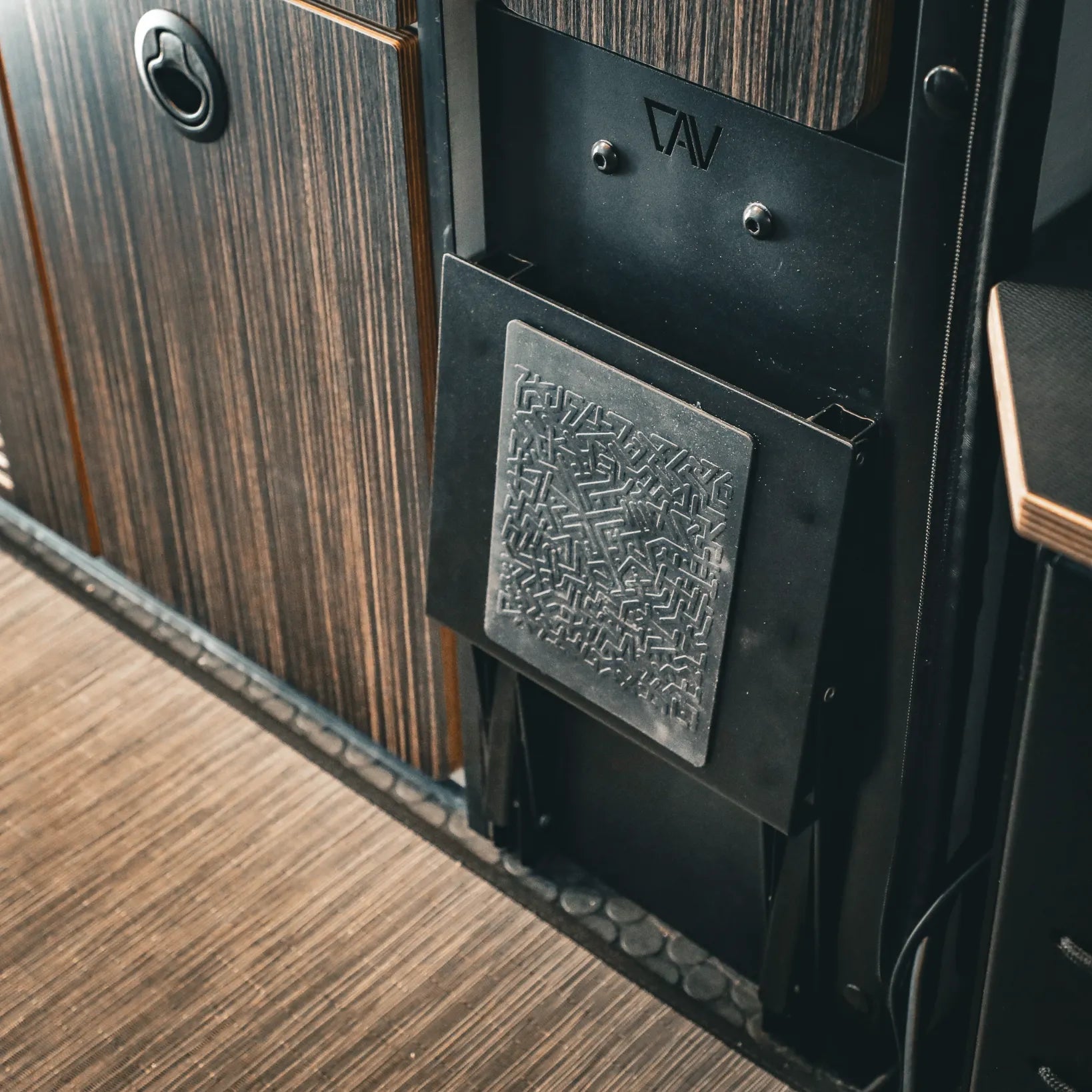 Folding Bed Step PRO by CAV installed in a Revel van interior from 2019 to 2024