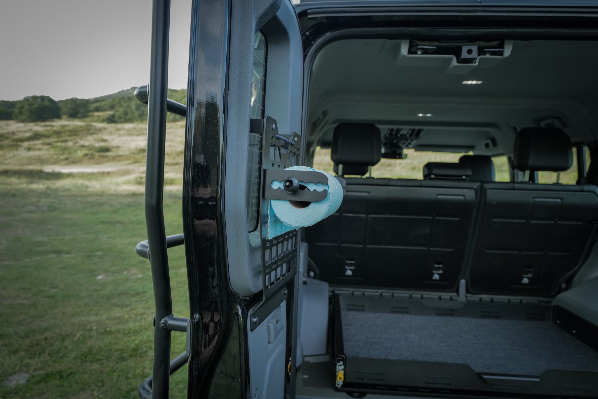 INEOS Grenadier driver rear door molle panel with optional paper towel holder