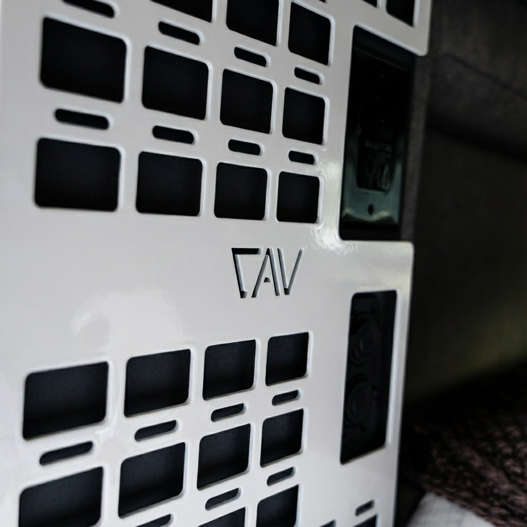 Close-up of CAV Storyteller Galley MOLLE panel inside a van interior wall.