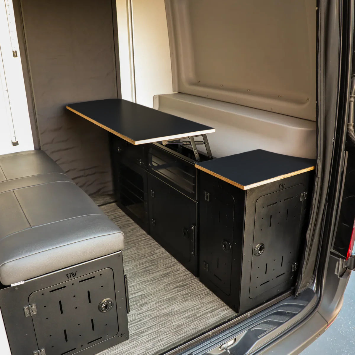 GLSS PRO storage system set installed in the driver and passenger side of a Winnebago Revel van interior.
