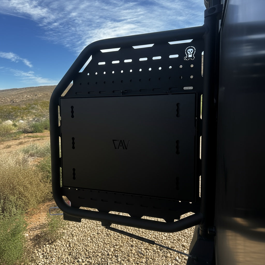 Closed CAV Ekko exterior drop-down table mounted to van rear door outdoors