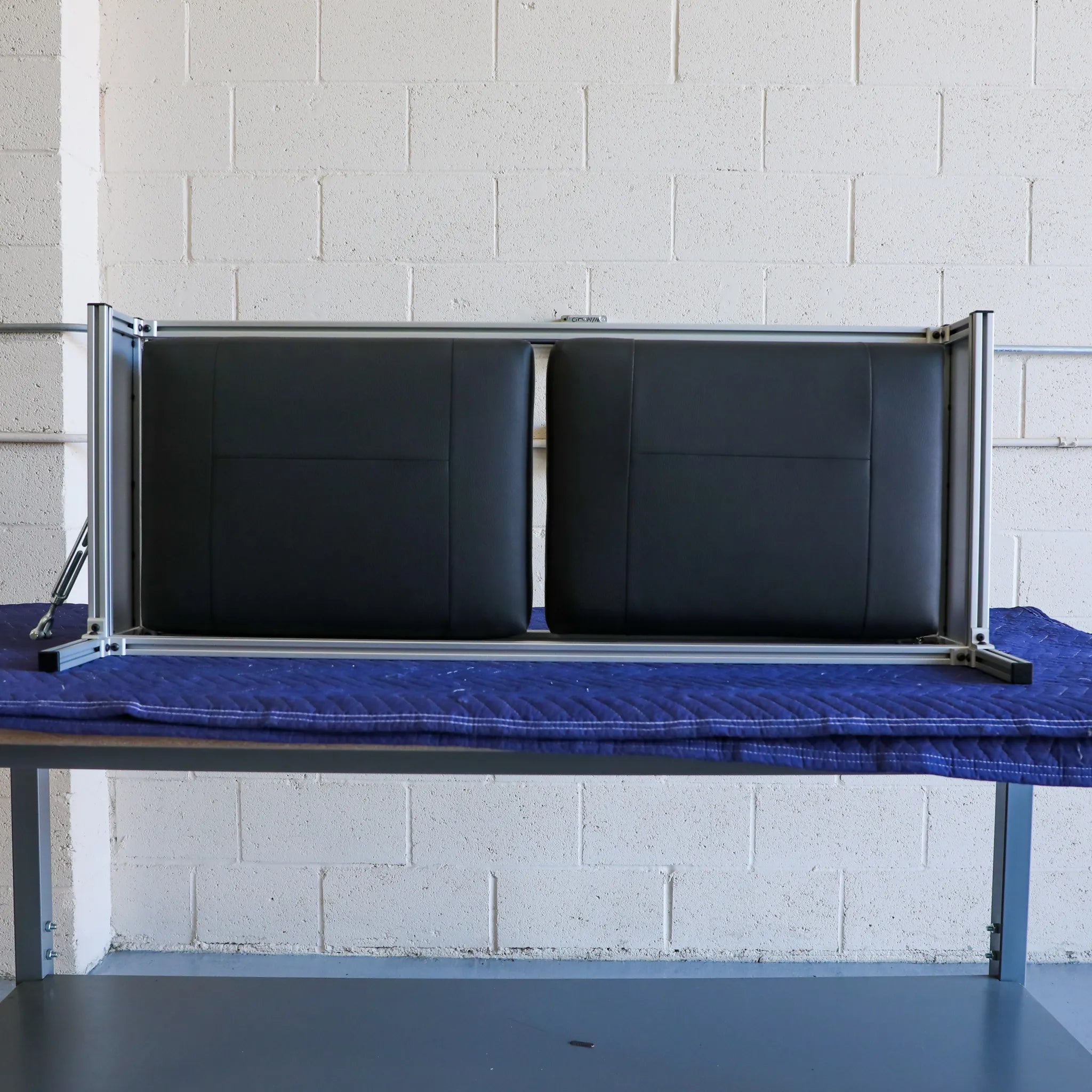 CSS-R countertop seating system installed in Revel '21-'24, showing metal frame and upholstery
