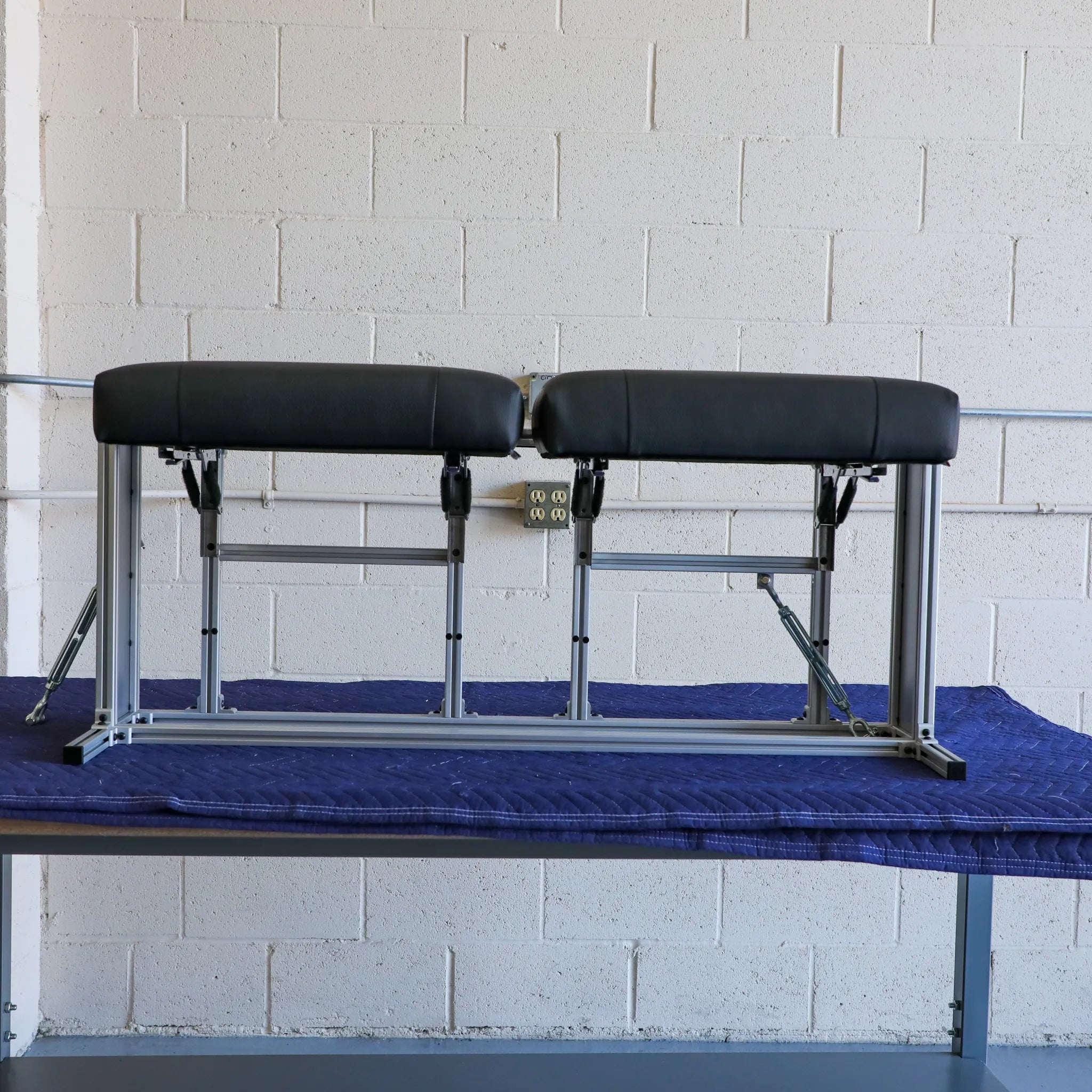 CSS-R countertop seating system installed in Revel '21-'24, showing modern design and stainless steel accents.