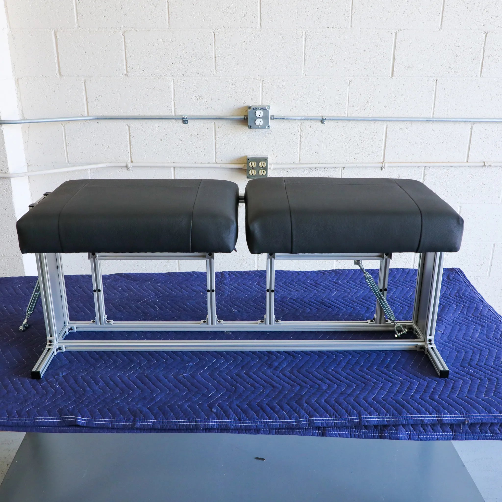 CSS-R countertop seating system for Revel '21-'24, shown with chairs on a modern kitchen counter.