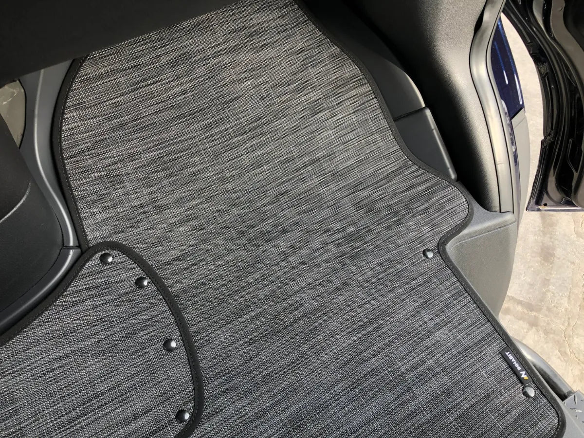 Floor mat system for 2025 Ekko Sprinter Canyon chassis, showing seat and floor coverage.