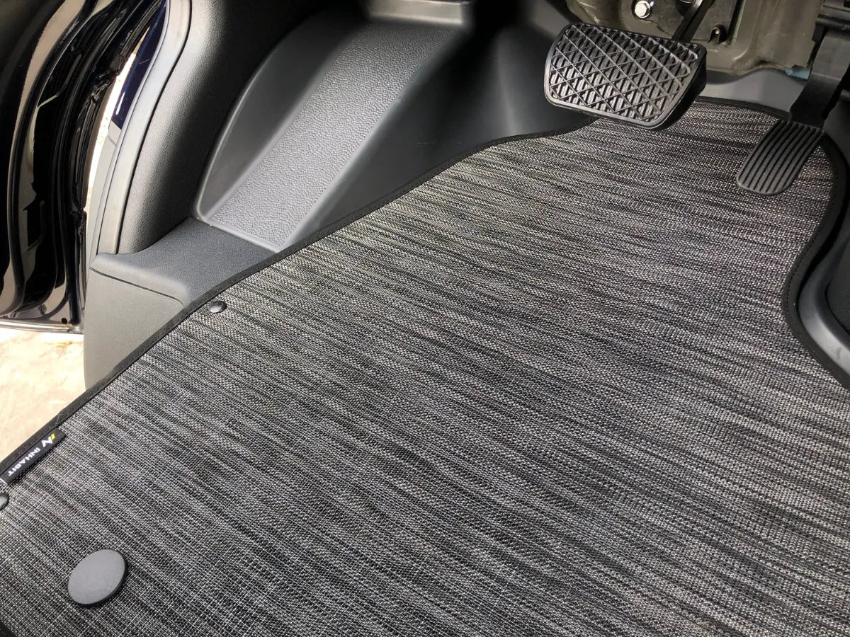 Floor mat system installed in the 2025 Ekko Sprinter Canyon chassis, showing the cab area interior.