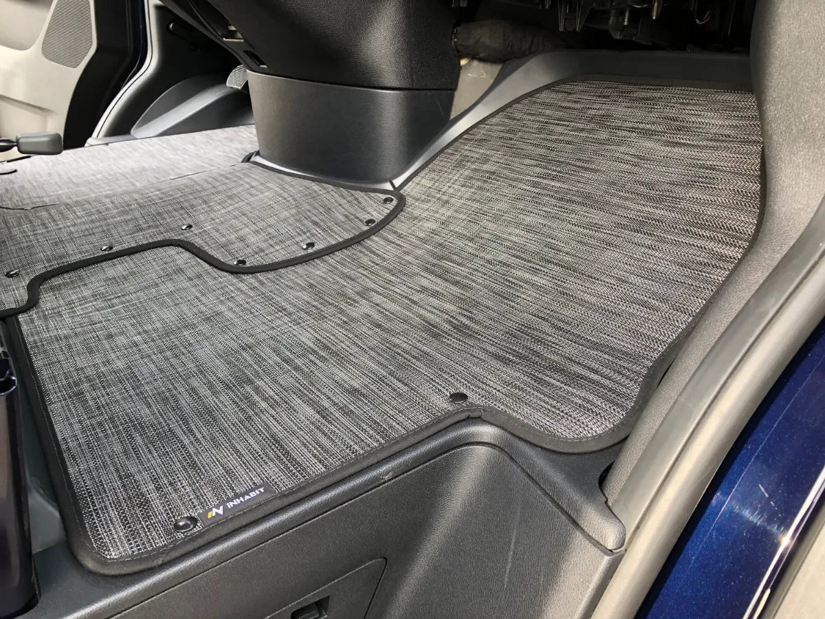 Floor mat system for the 2025 Ekko Sprinter chassis, shown in the cab interior with textured surface and tailored fit.