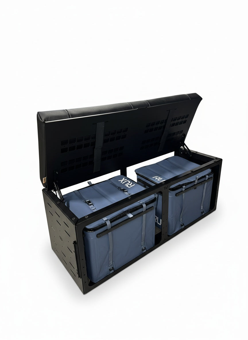 GLSS Rux bench seat with open lid showing two blue Rux storage bins inside a black metal frame.