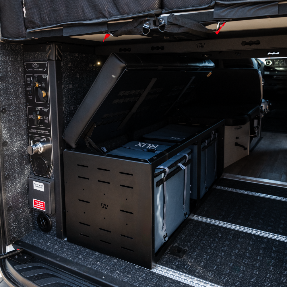 GLSS Rux storage bins and seating system in the rear compartment of a van interior.