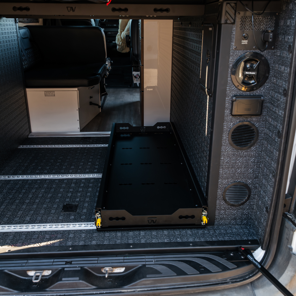 TAV 48-inch cargo tray slide extended from the rear of a van interior.