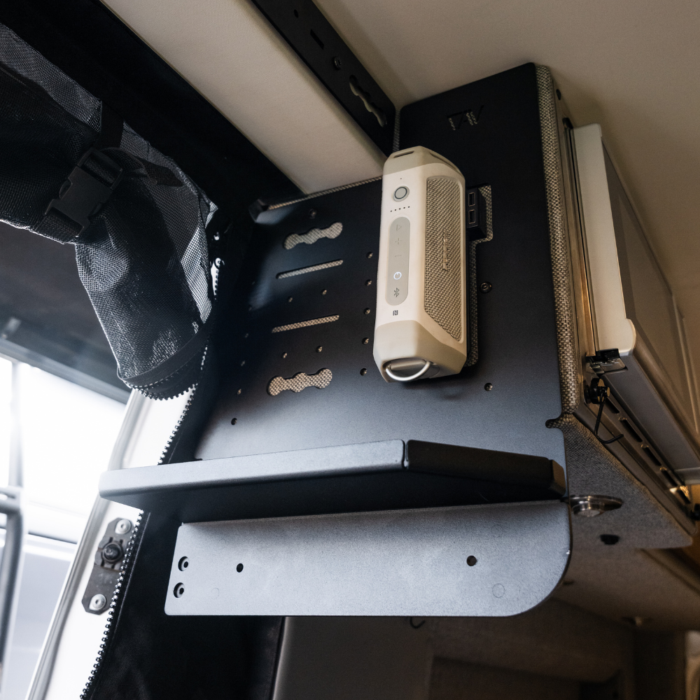 Canyon Kitchen Caddy mounted inside a Storyteller van with a compact appliance on the shelf.