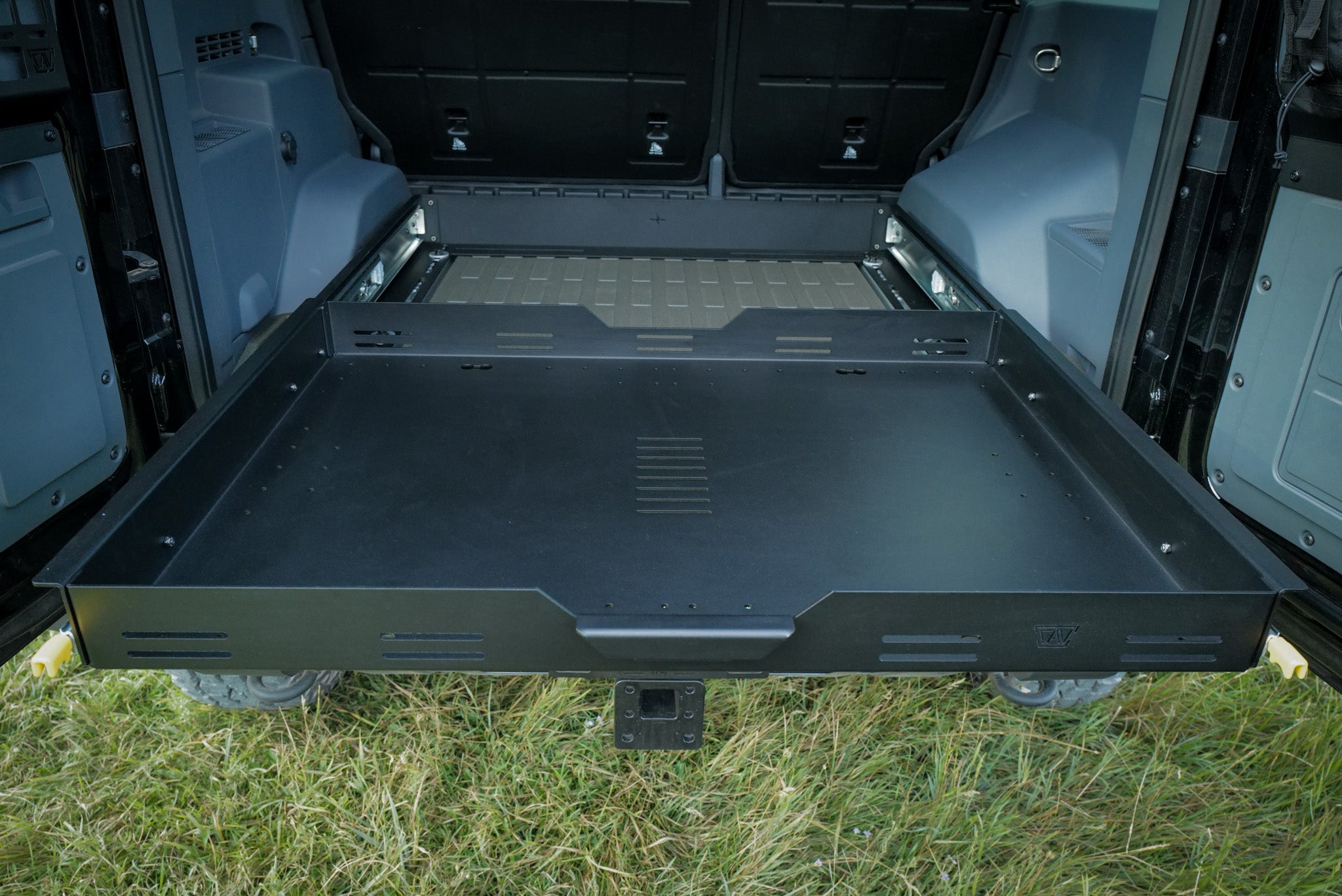 INEOS Grenadier Cargo Tray slid out in rear cargo area