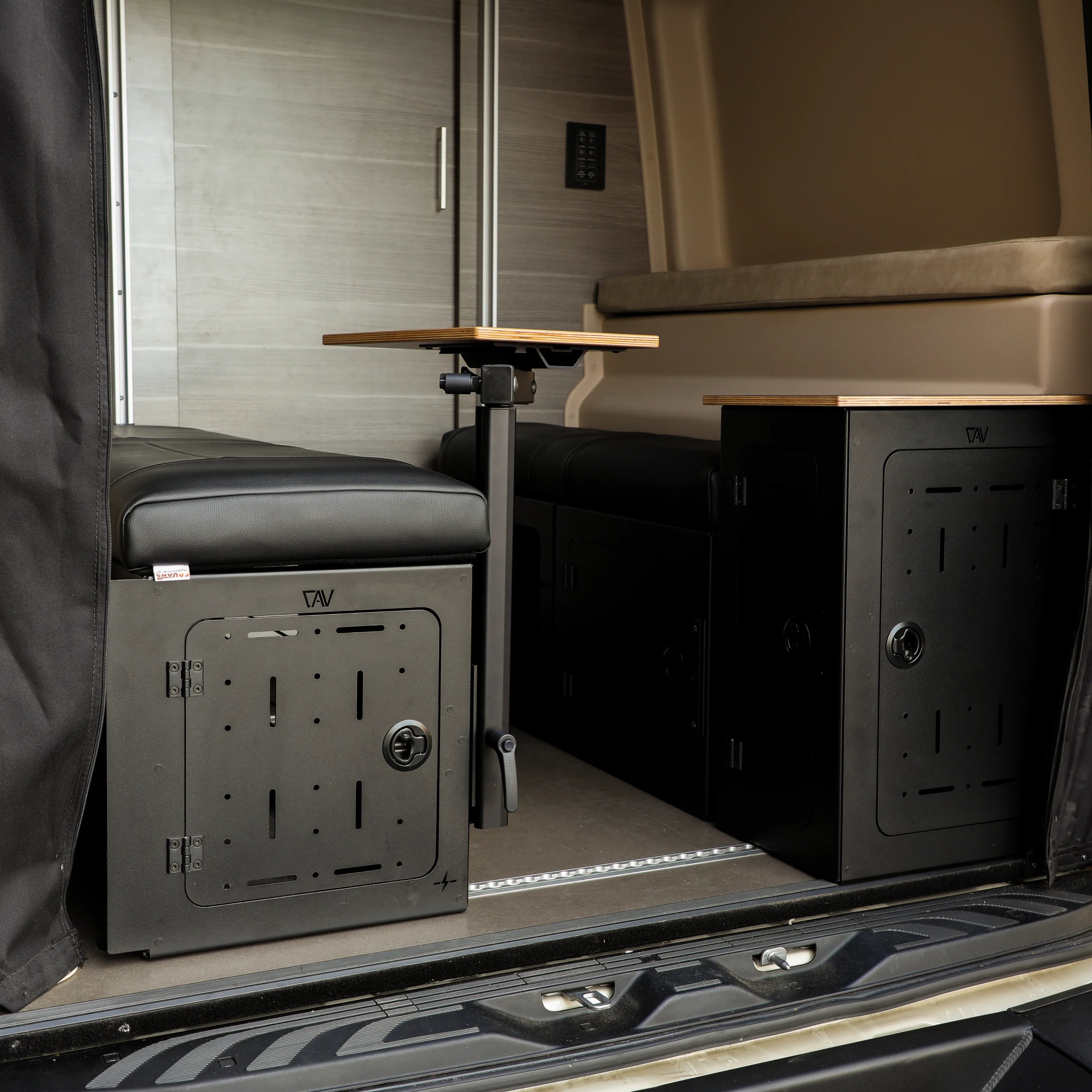 Drawer Box and adjustable table setup from GLSS PRO inside a van rear cabin.