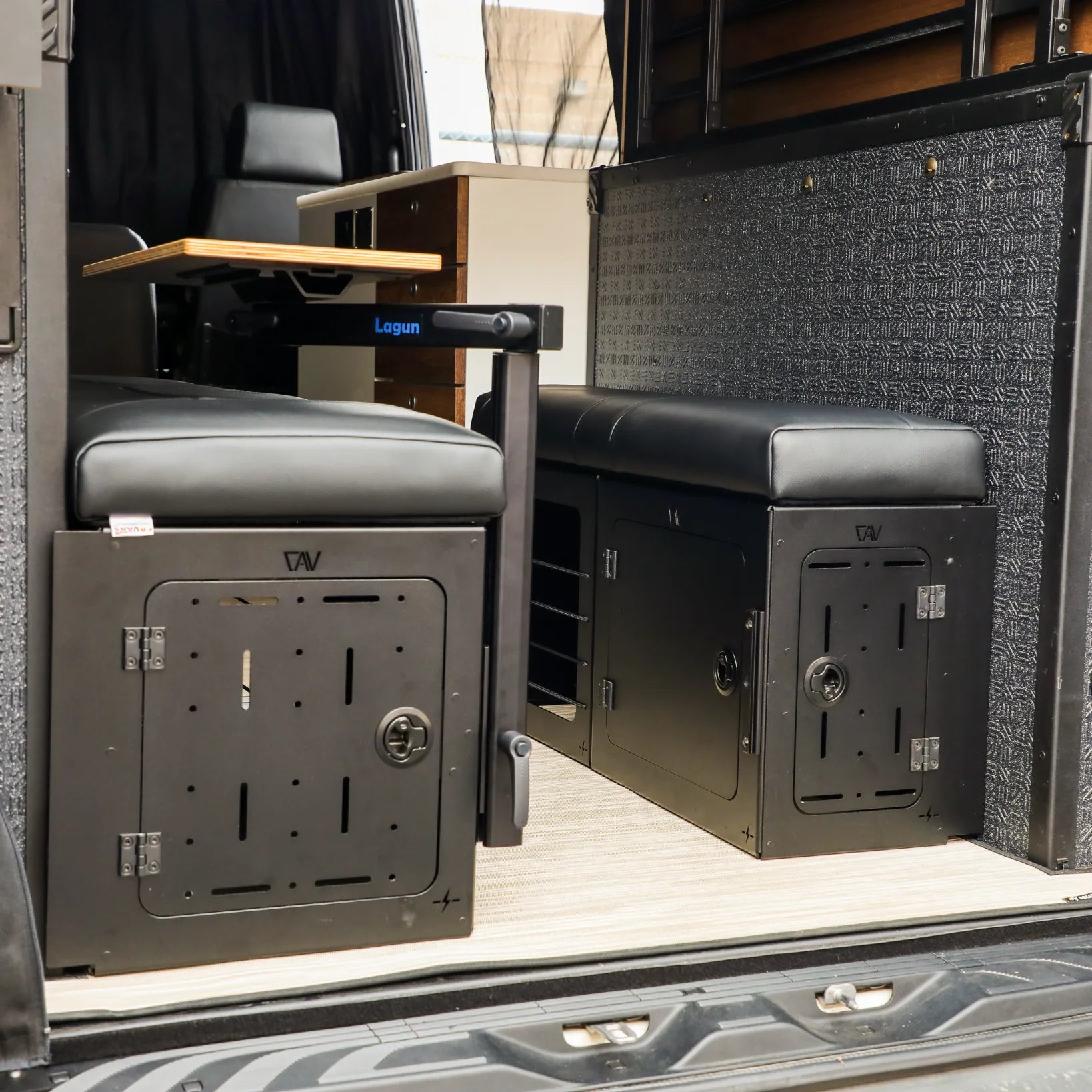 GLSS PRO storage system set installed in a van with seating and table visible