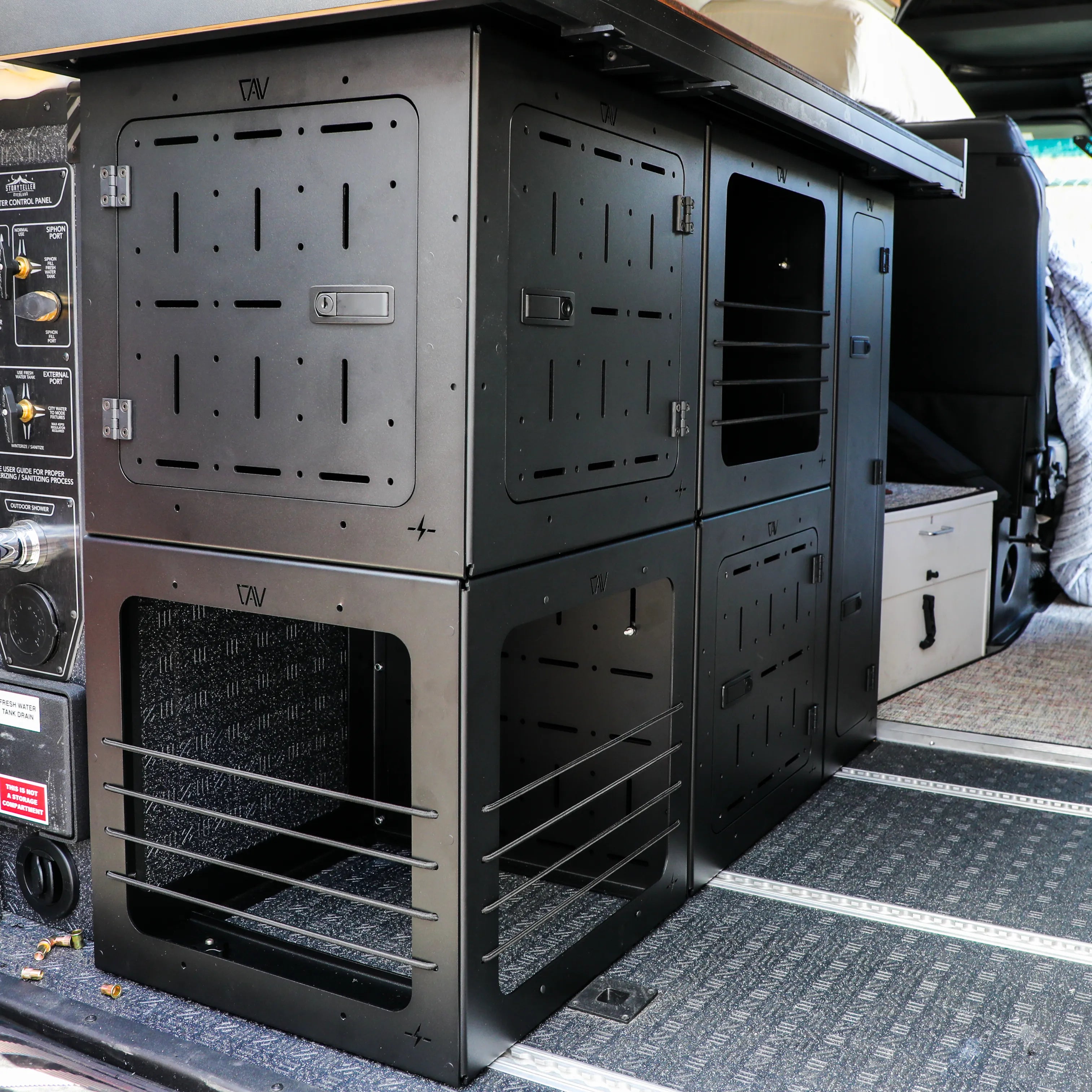 GSS PRO garage storage system by Van Arsenal installed in a Storyteller van interior.