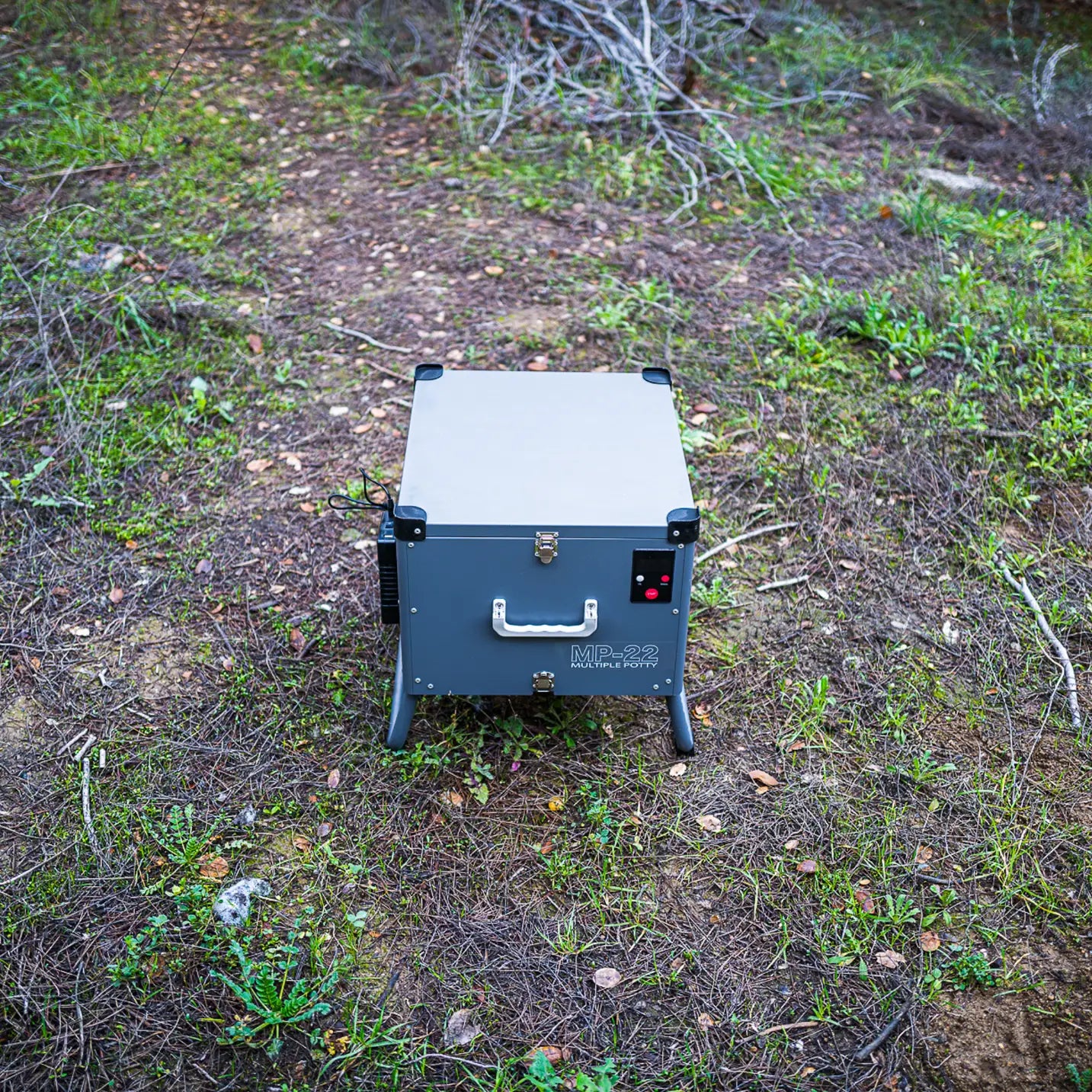 Mobile automatic toilet with handle, compact design for convenience.