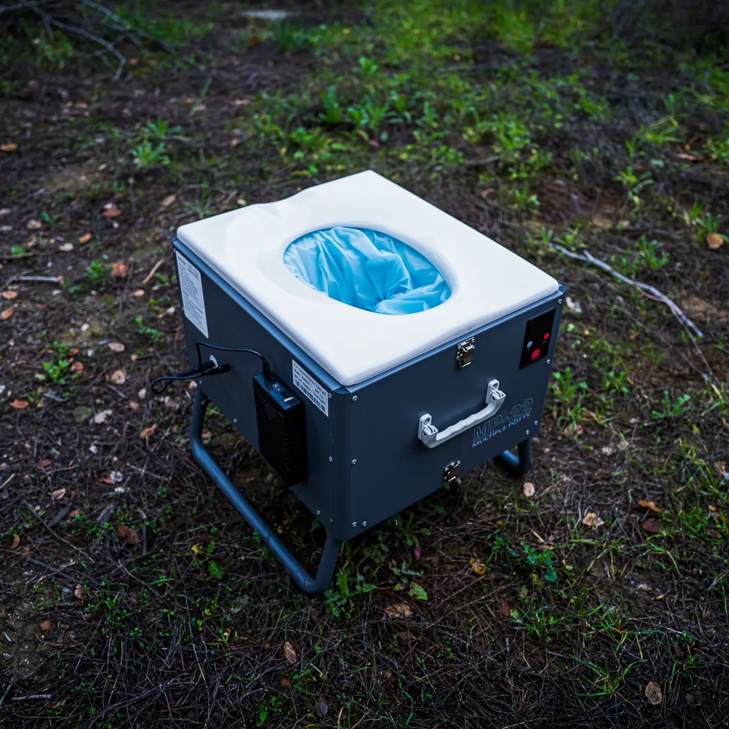 Automatic mobile toilet with handle and sleek design, suitable for portable sanitation needs.