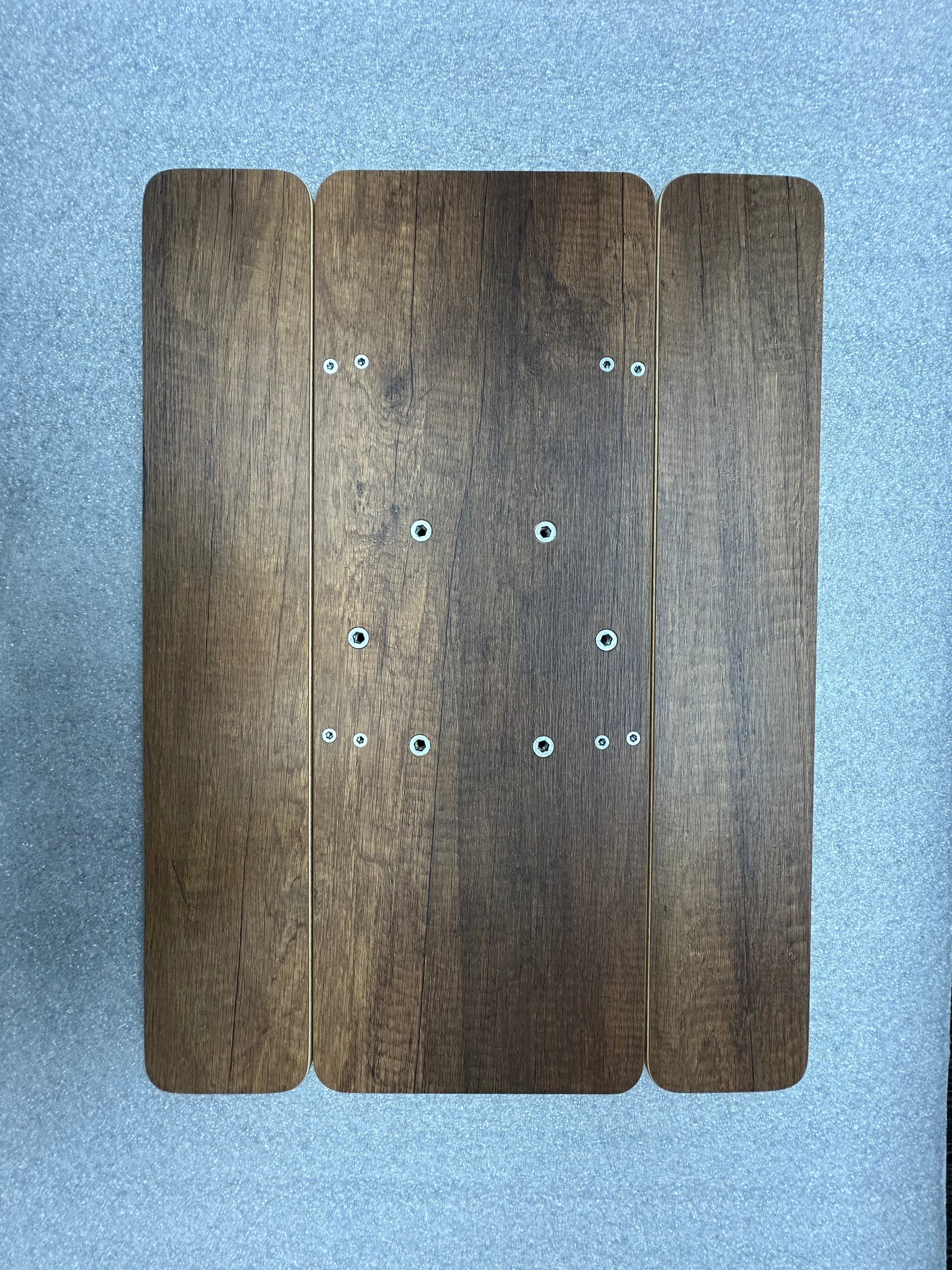 Revel Mini Skinny Folding Table Top with dark wood finish, shown fully extended on a flat surface