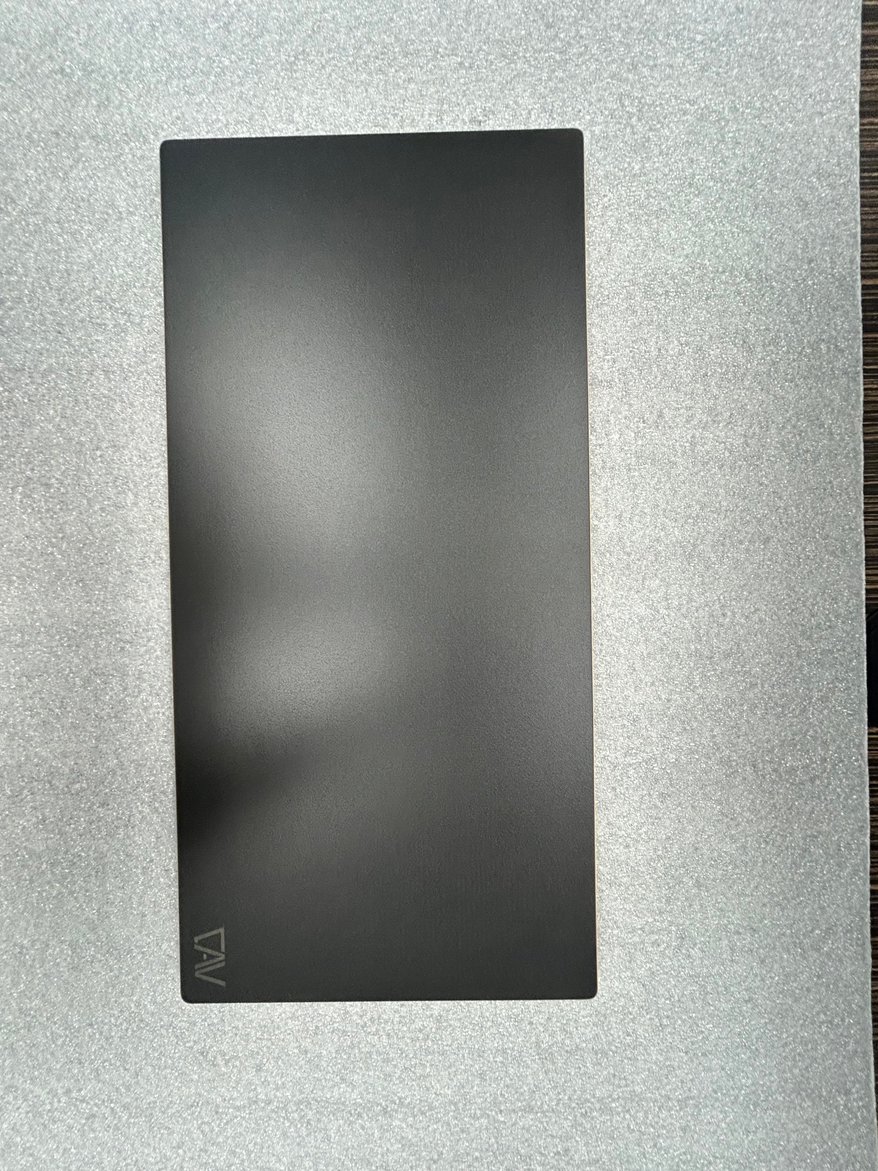 Small GH1 universal tabletop in matte black finish on a van counter surface