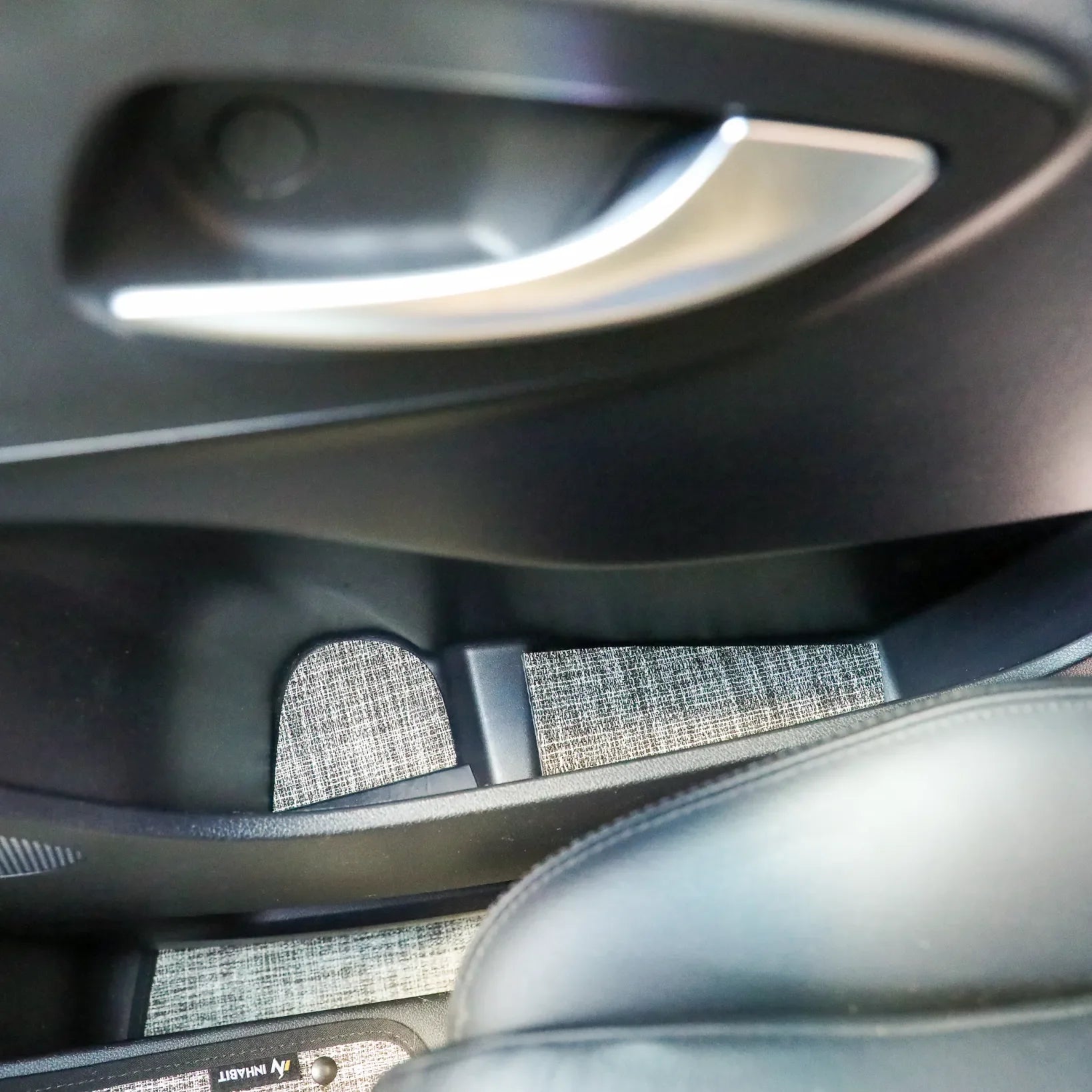 Front view of the Inhabit floor mat system installed in the 2025 Ekko Sprinter chassis cabin