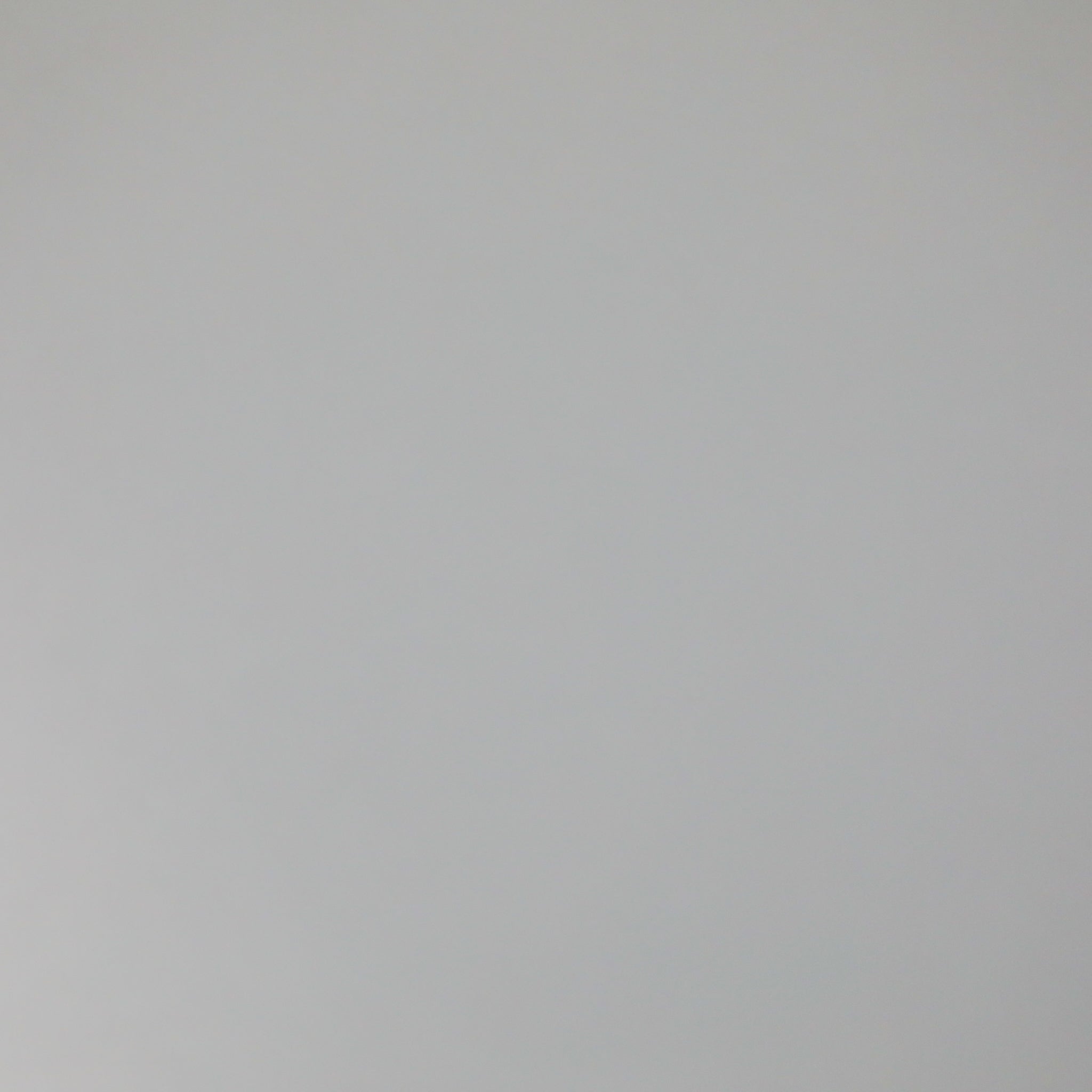 Close-up of a plain white cabinet panel from the Revel overhead microwave cabinet kit.