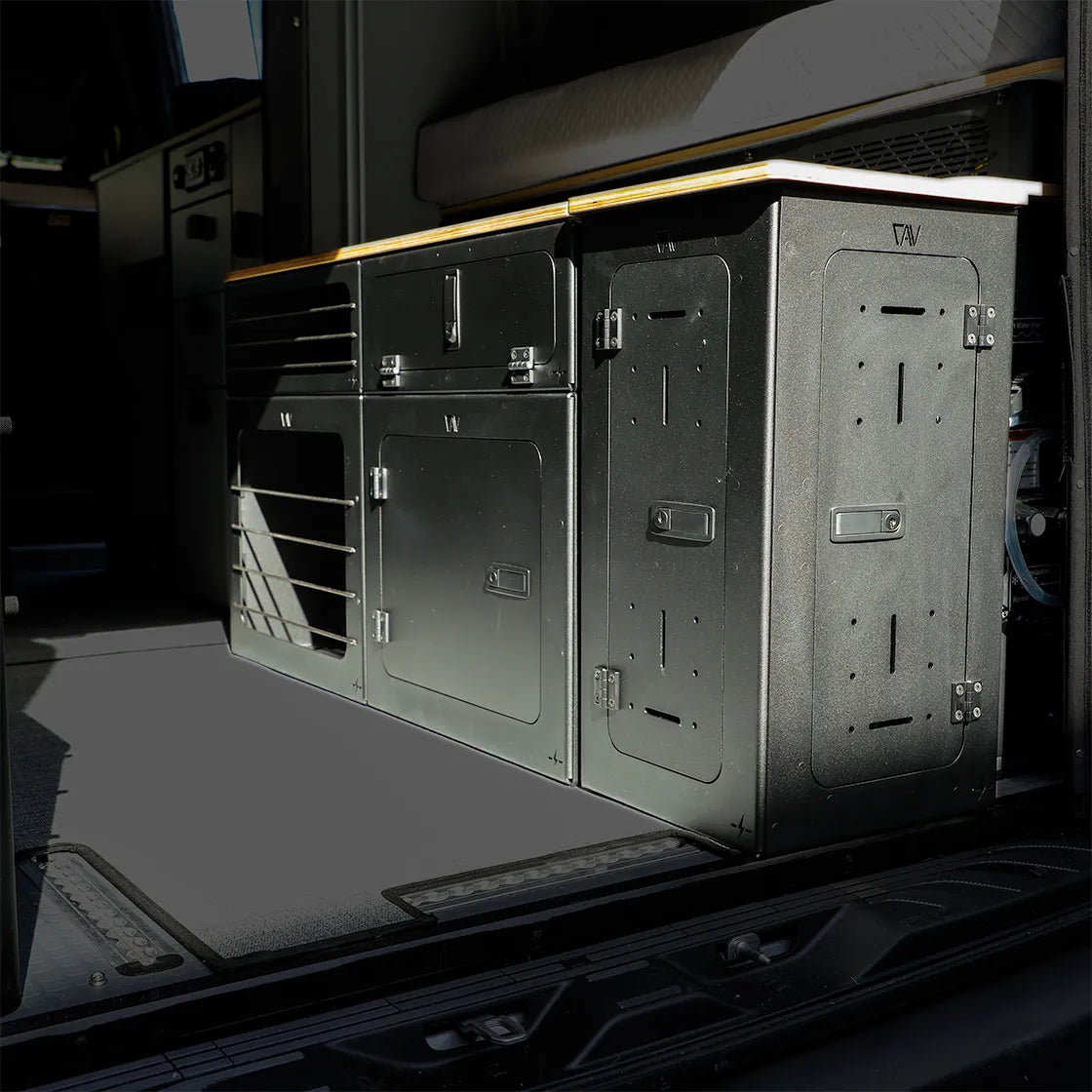 GLSS Passenger PRO with desk and H2O Box installed in a 2025 Revel van interior