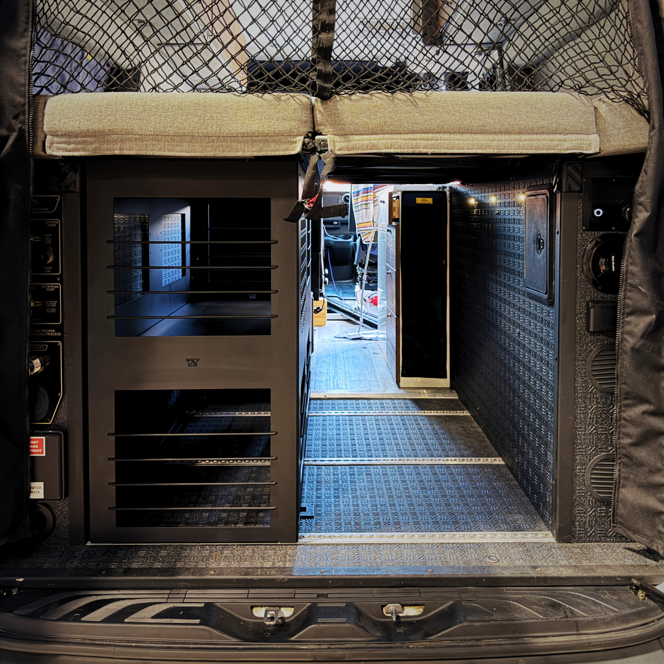 gss lite canyon adventure vans in storyteller overland mode sprinter storage with shelf and bungees molle panel bed on top