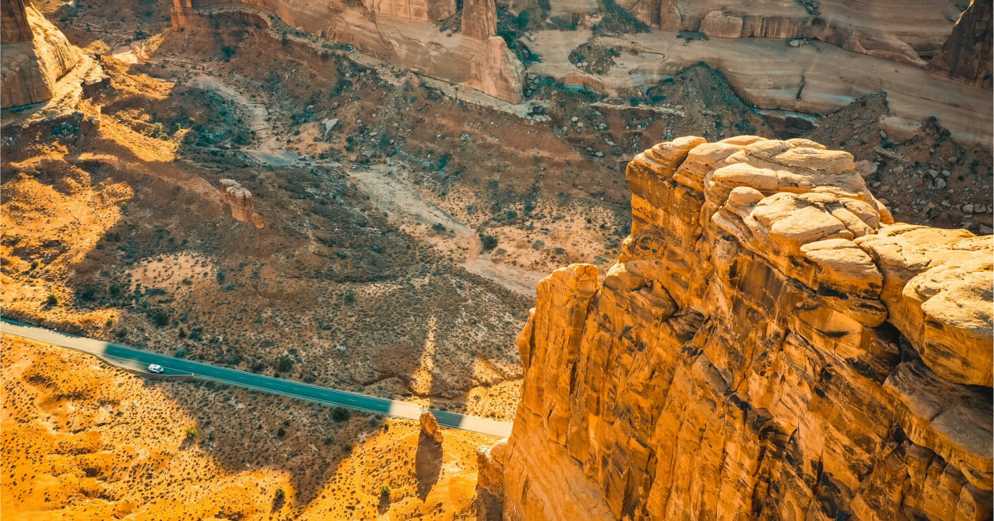Close-up of a handmade ceramic mug with a textured surface and natural glaze.