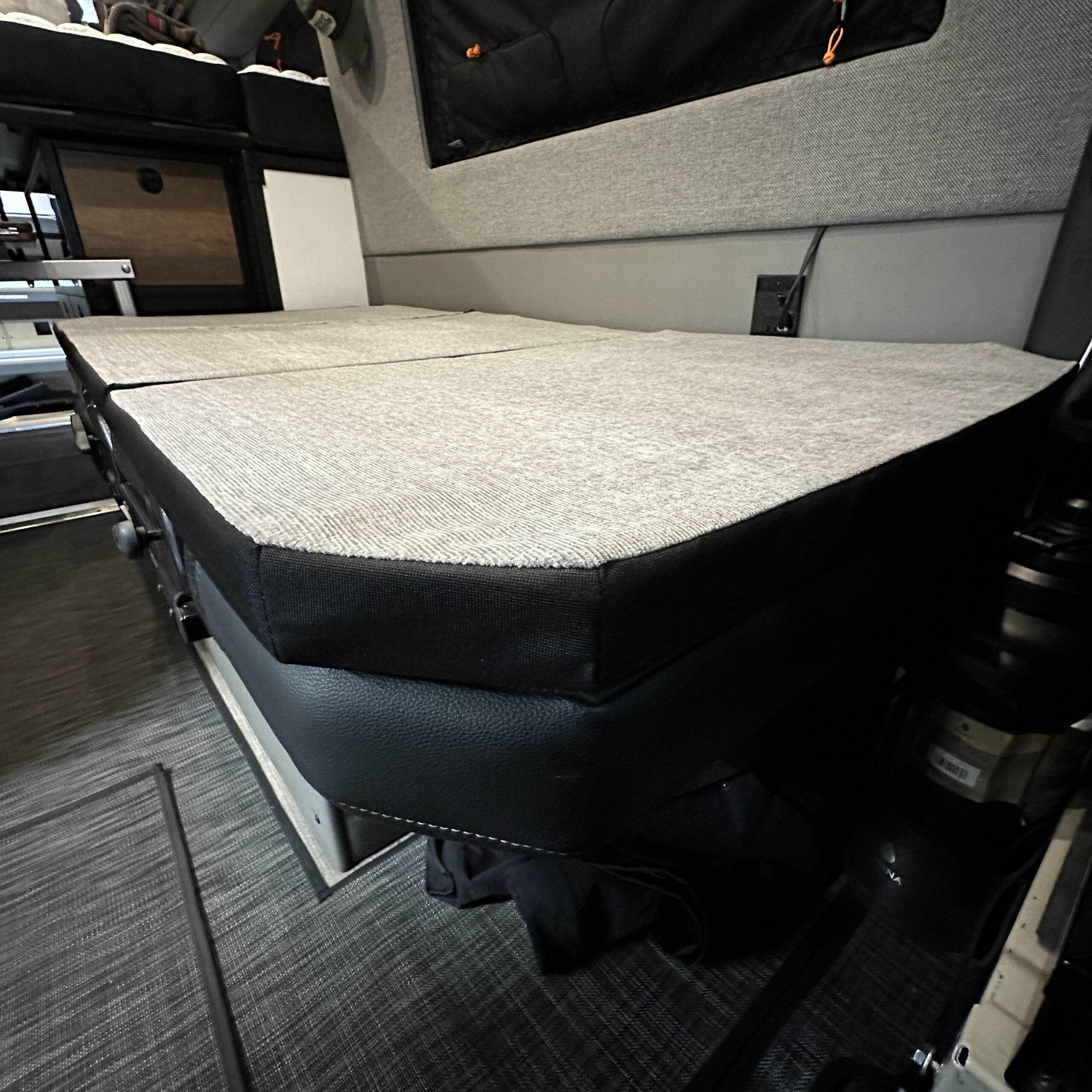 Groove Lounge Mattress Topper for Storyteller van, padded inset cushions on folded sleeping surface
