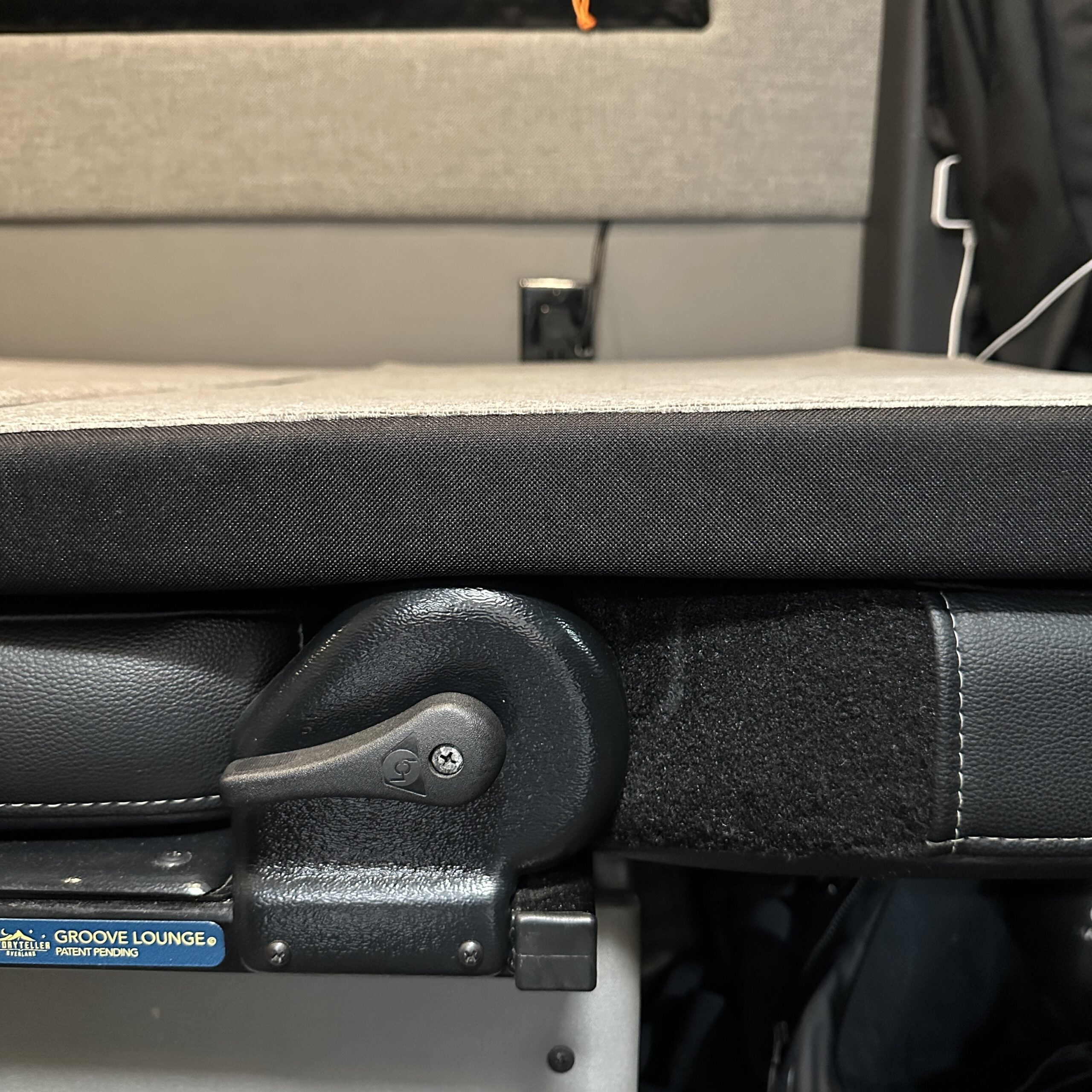 Close-up of Groove Lounge Mattress Topper for the Storyteller van interior setup