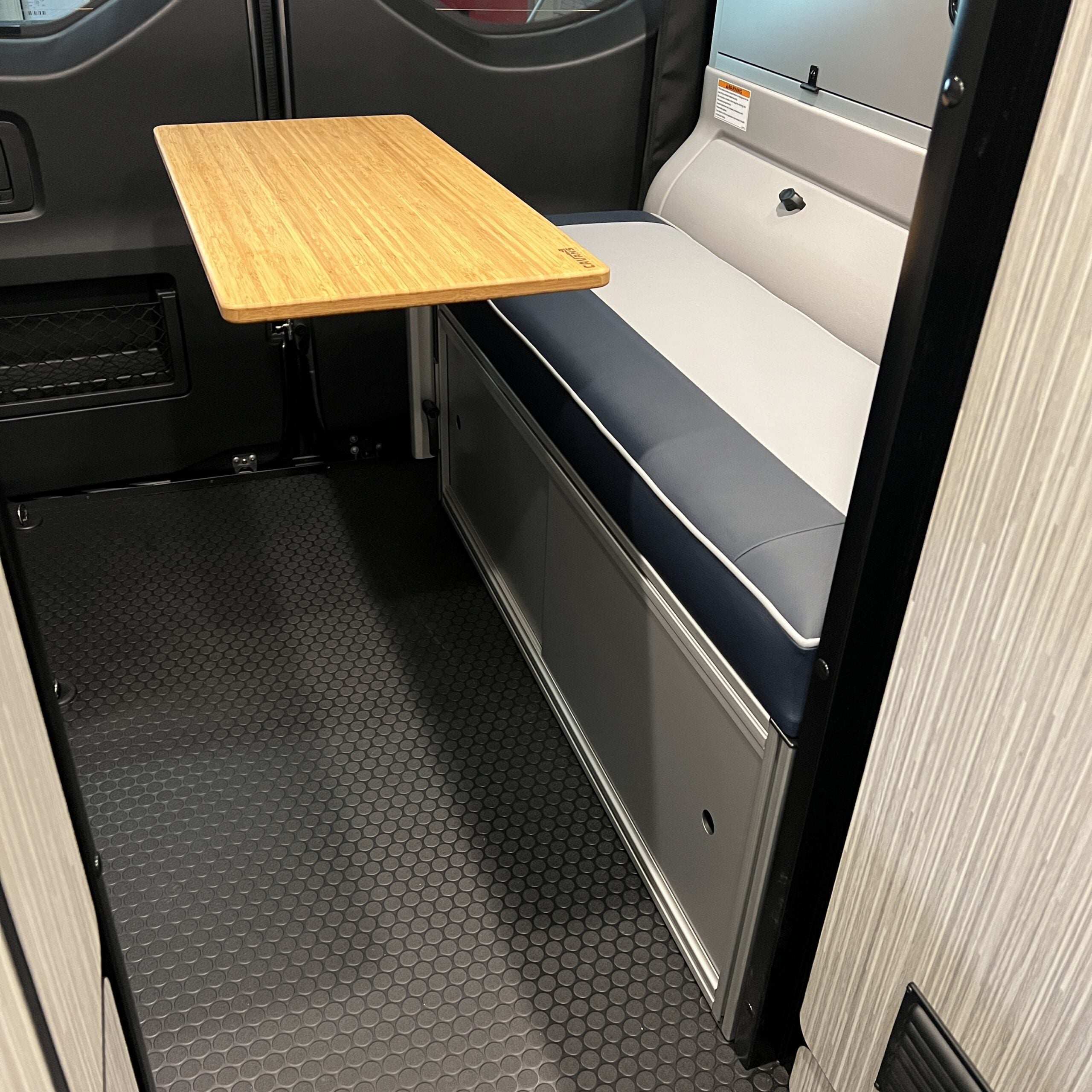 The 2021+ GLSS™ GARAGE LOUNGE STORAGE SYSTEM / DRIVER SIDE ONLY made for the 2021+ REVEL Patent Pending