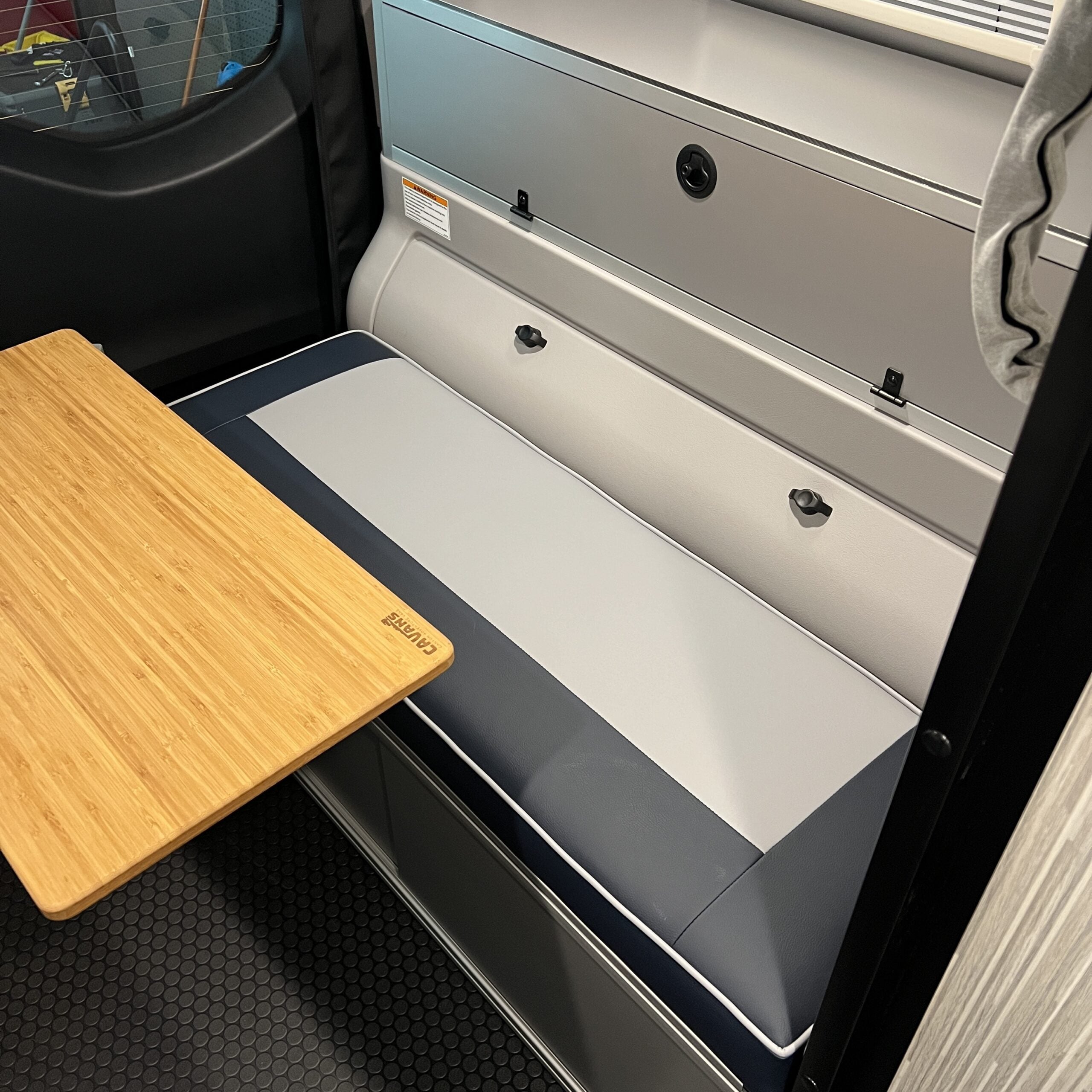 The 2021+ GLSS™ GARAGE LOUNGE STORAGE SYSTEM / DRIVER SIDE ONLY made for the 2021+ REVEL Patent Pending