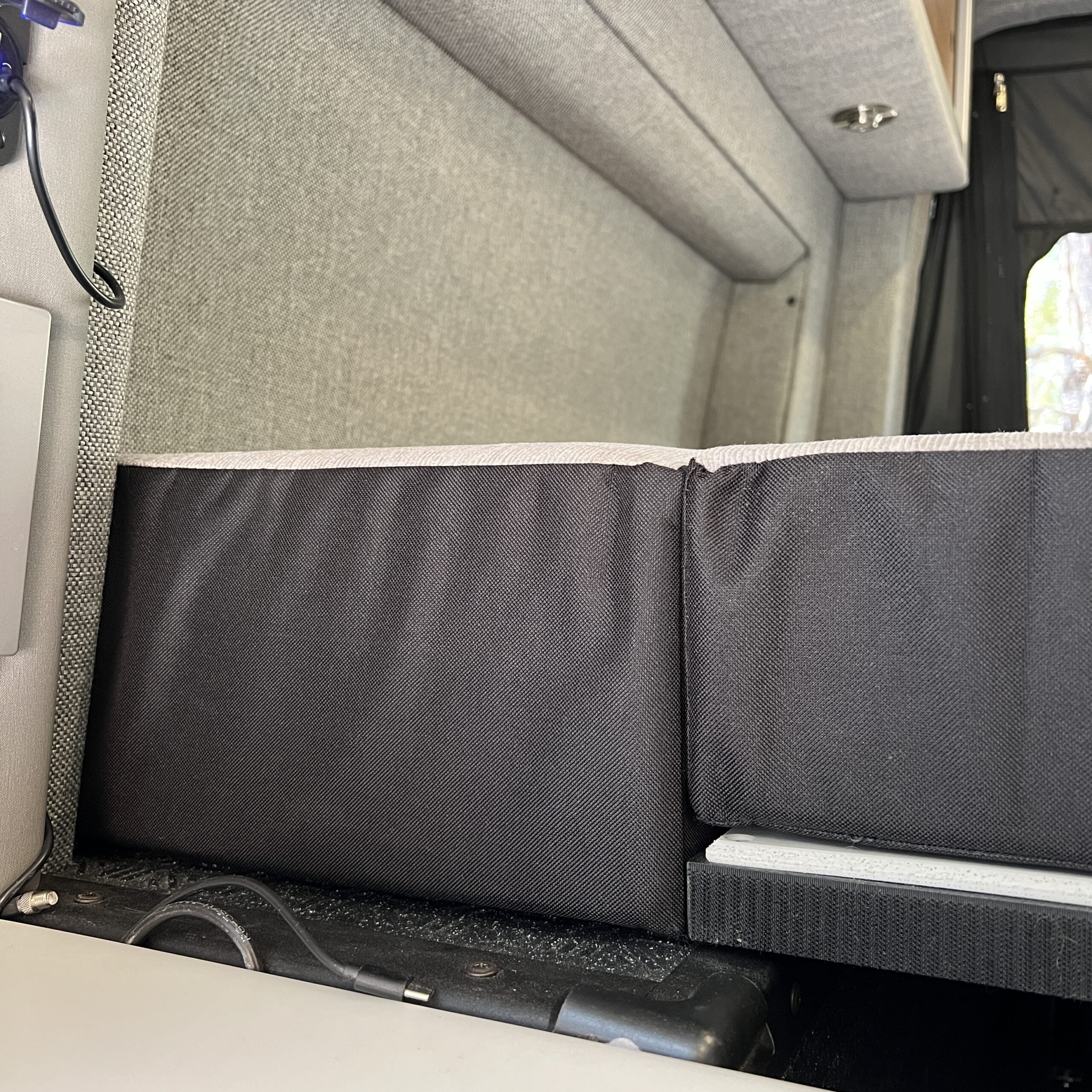 Luxe5 Cooling Memory Foam 5-inch mattress in semi-firm setup inside a van interior.
