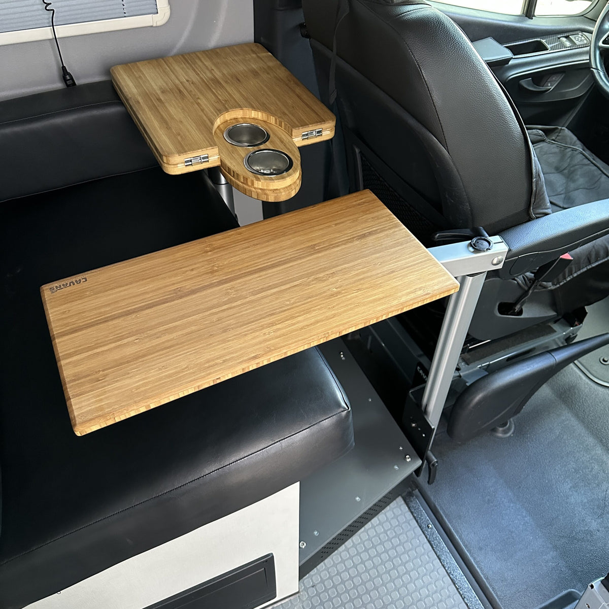 table mount Long Leg bamboo table mounted in van seating area beside driver seat