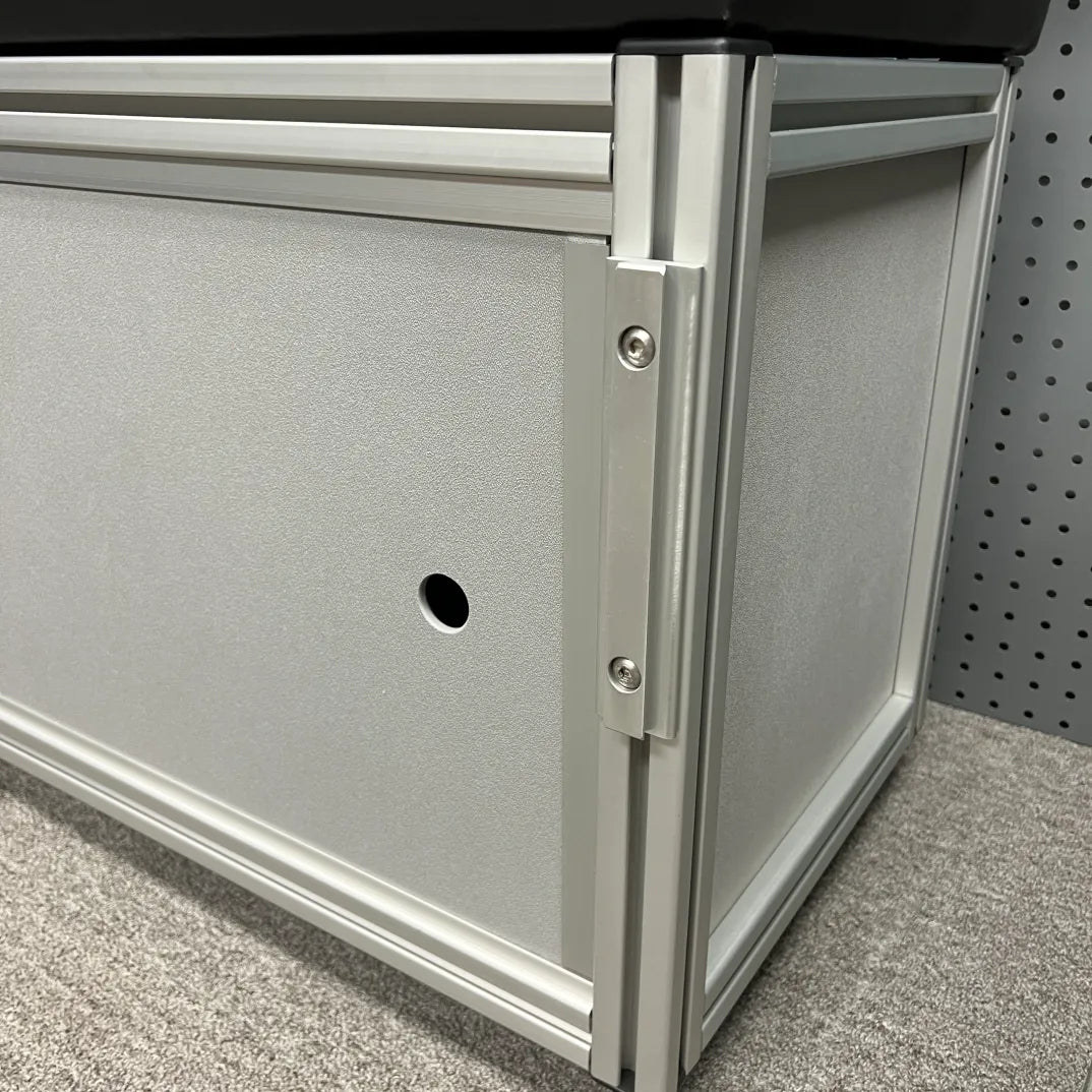 Close-up of Slim Bracket console table mount installed in a van interior