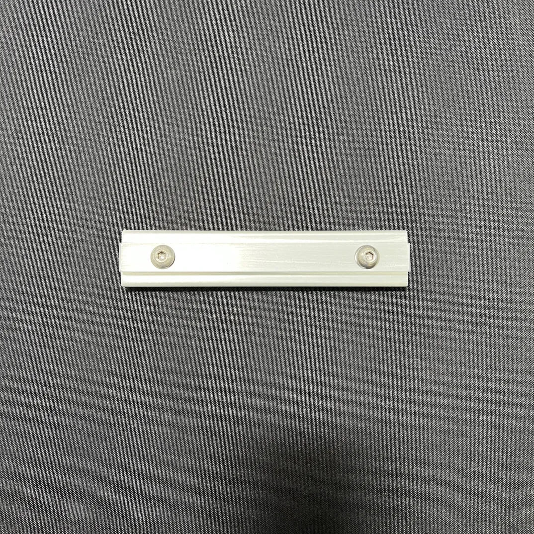 Slim aluminum bracket with two screws, designed as a console table or table mounts replacement.