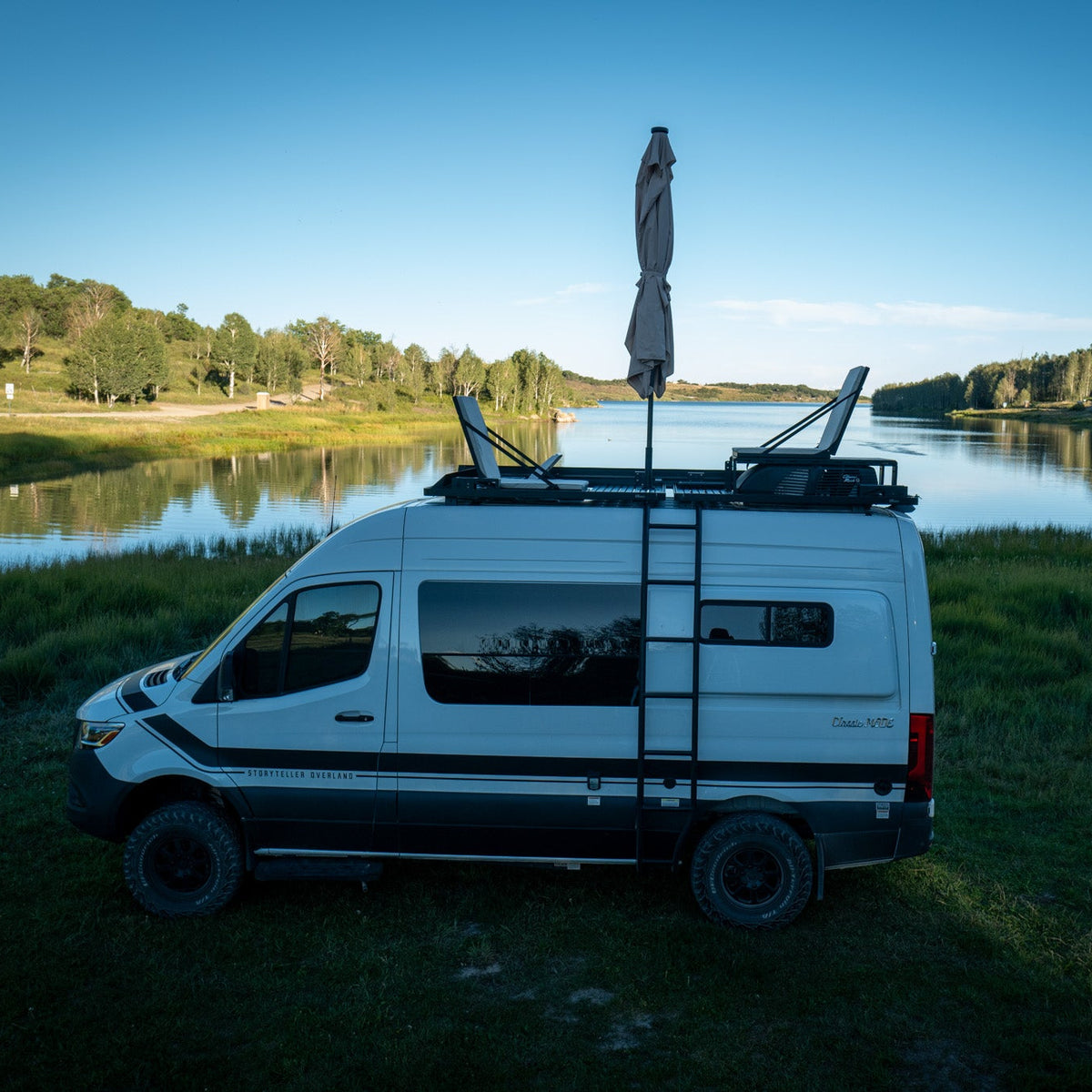 Storyteller Overland rooftop lounge with a/c platform and folding seats