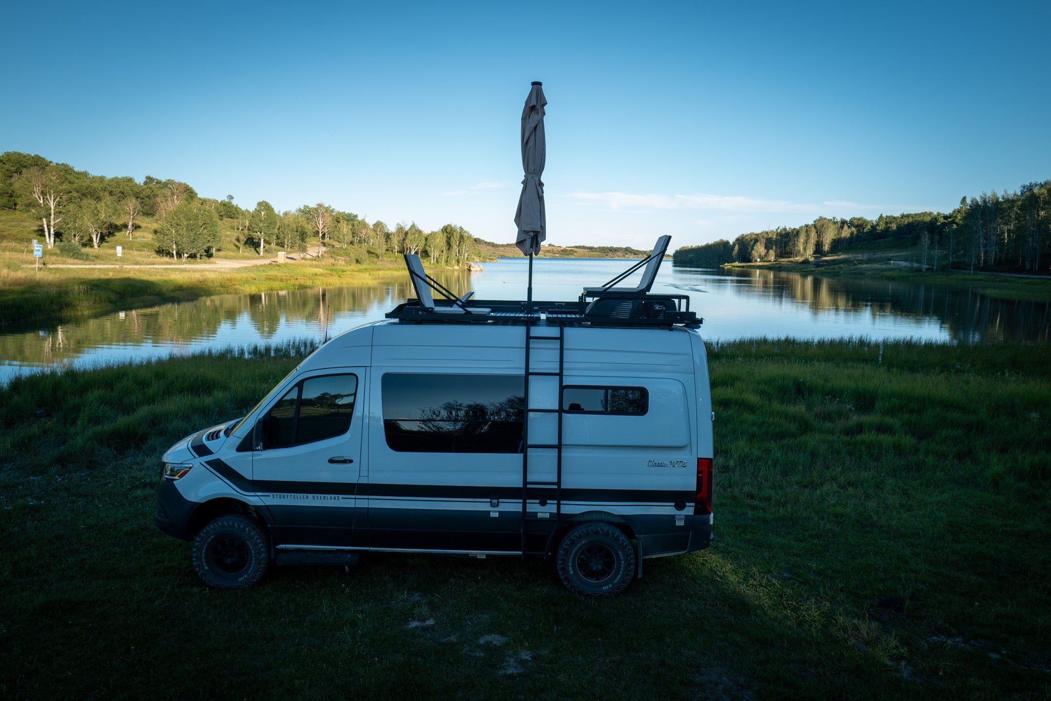 Storyteller Overland rooftop lounge with a/c platform and folding seats