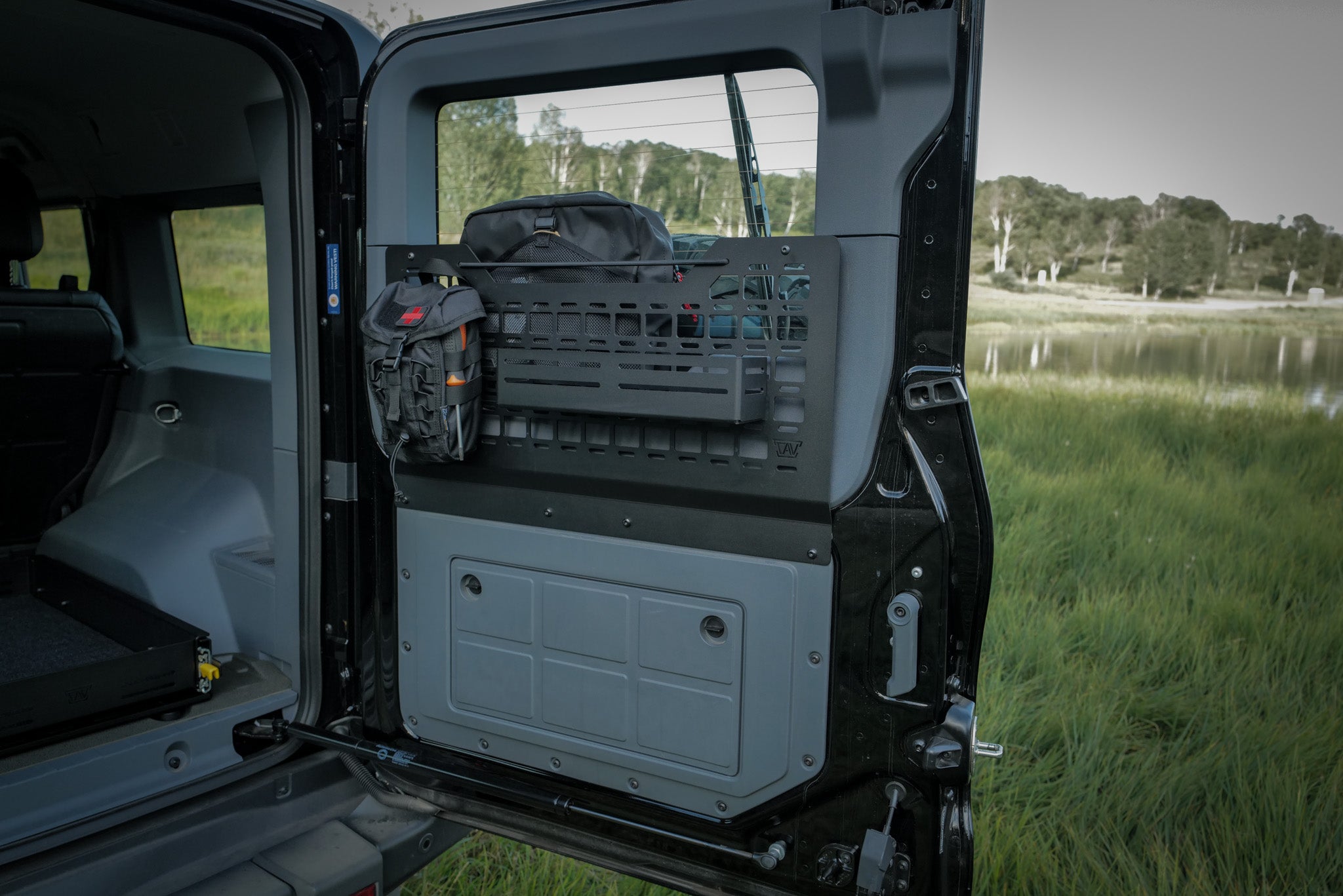 Canyon Adventure Vans INEOS Grenadier rear door molle pane