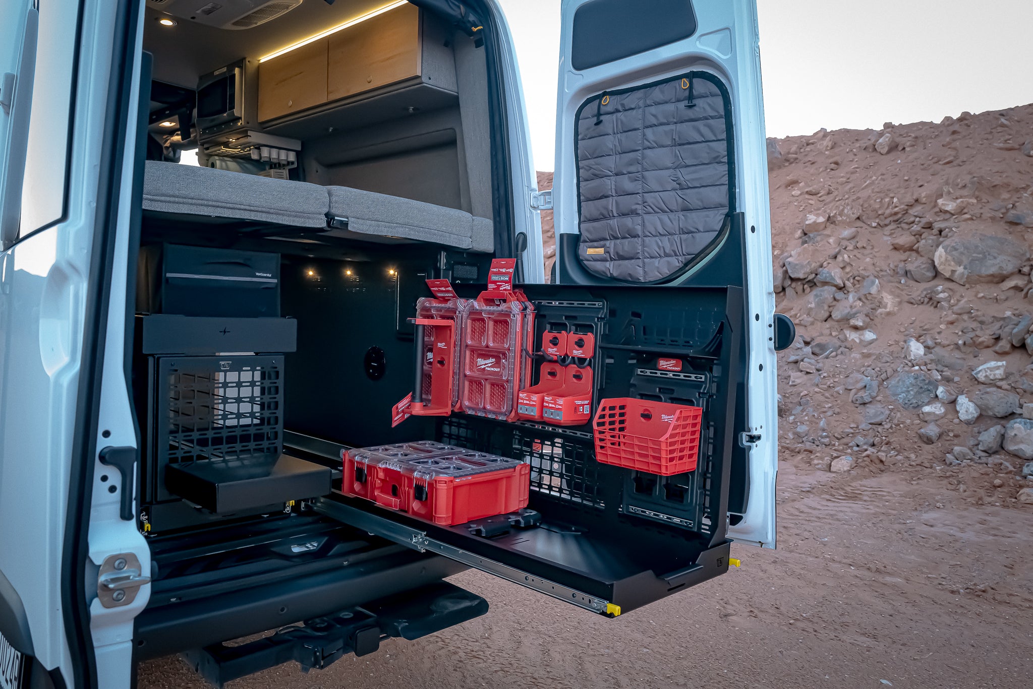48x19 slide in storyteller mercedes sprinter van with gear wall showing milwaukee tool organizer bins