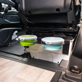 Revel Canyon Pet Bowl with green and blue collapsible bowls mounted under van seat