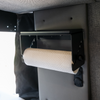 Canyon paper towel holder mounted inside a van under a cabinet