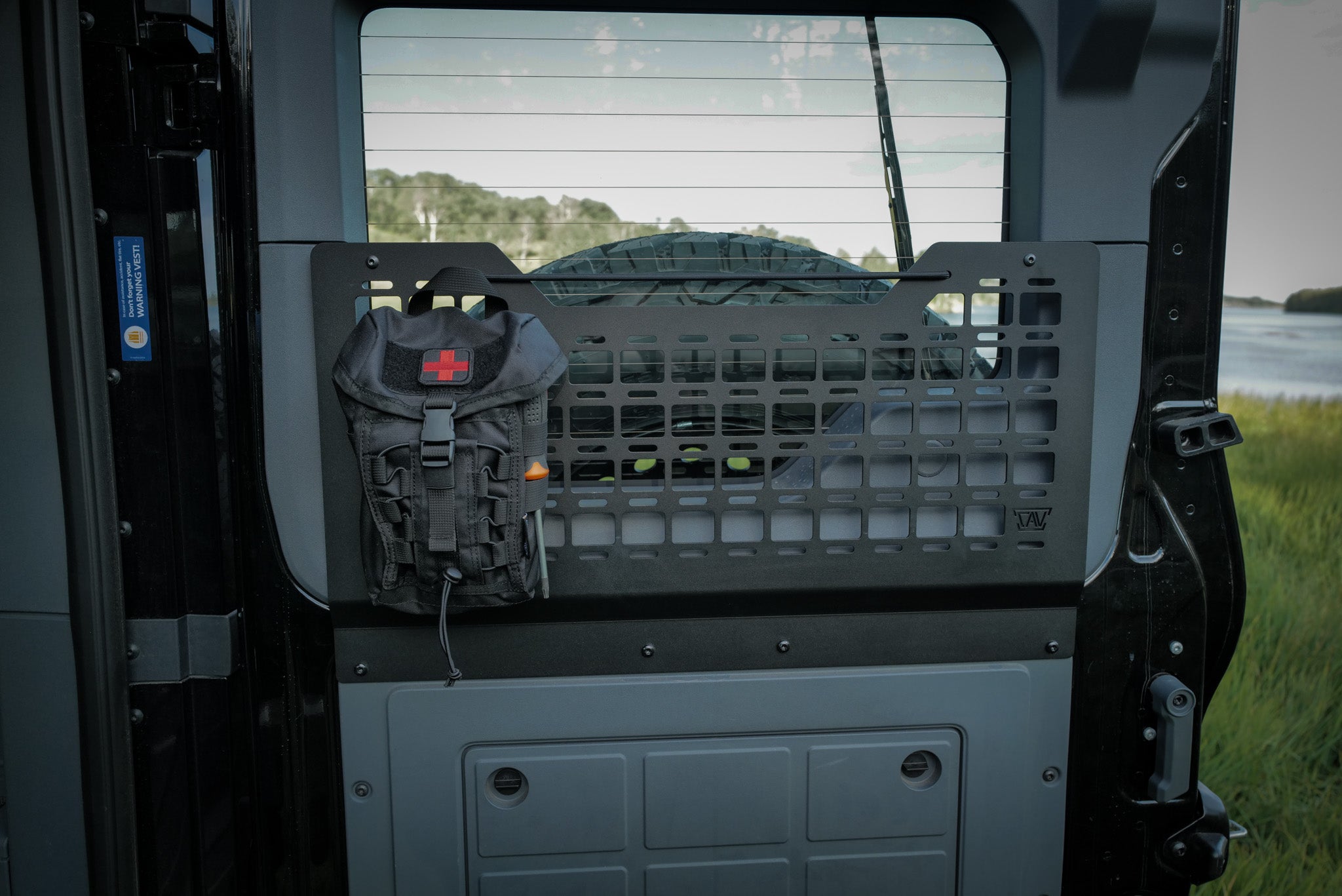 INEOS Grenadier passenger door molle storage system