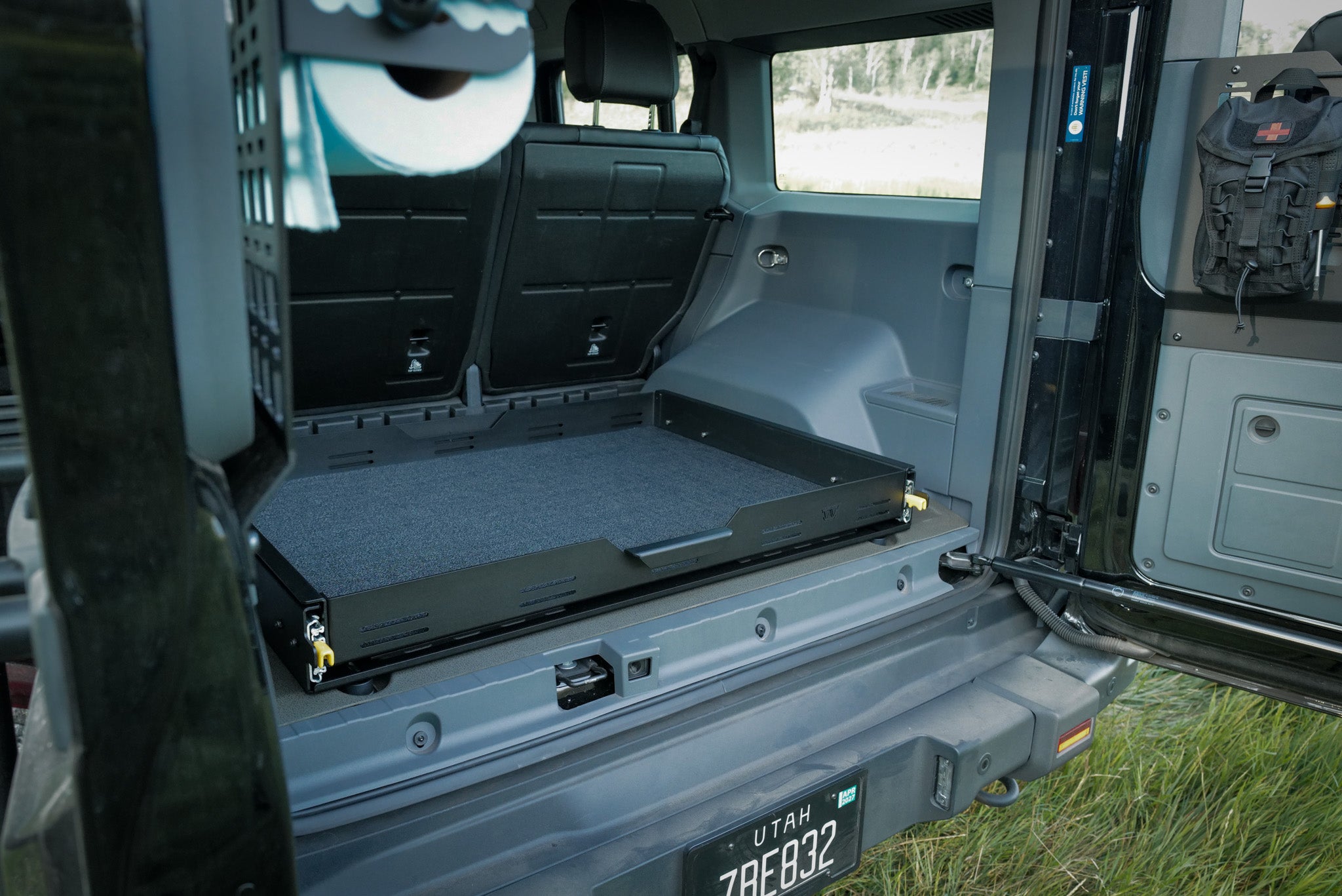 INEOS Grenadier sliding Cargo Tray mounted to factory L-Track