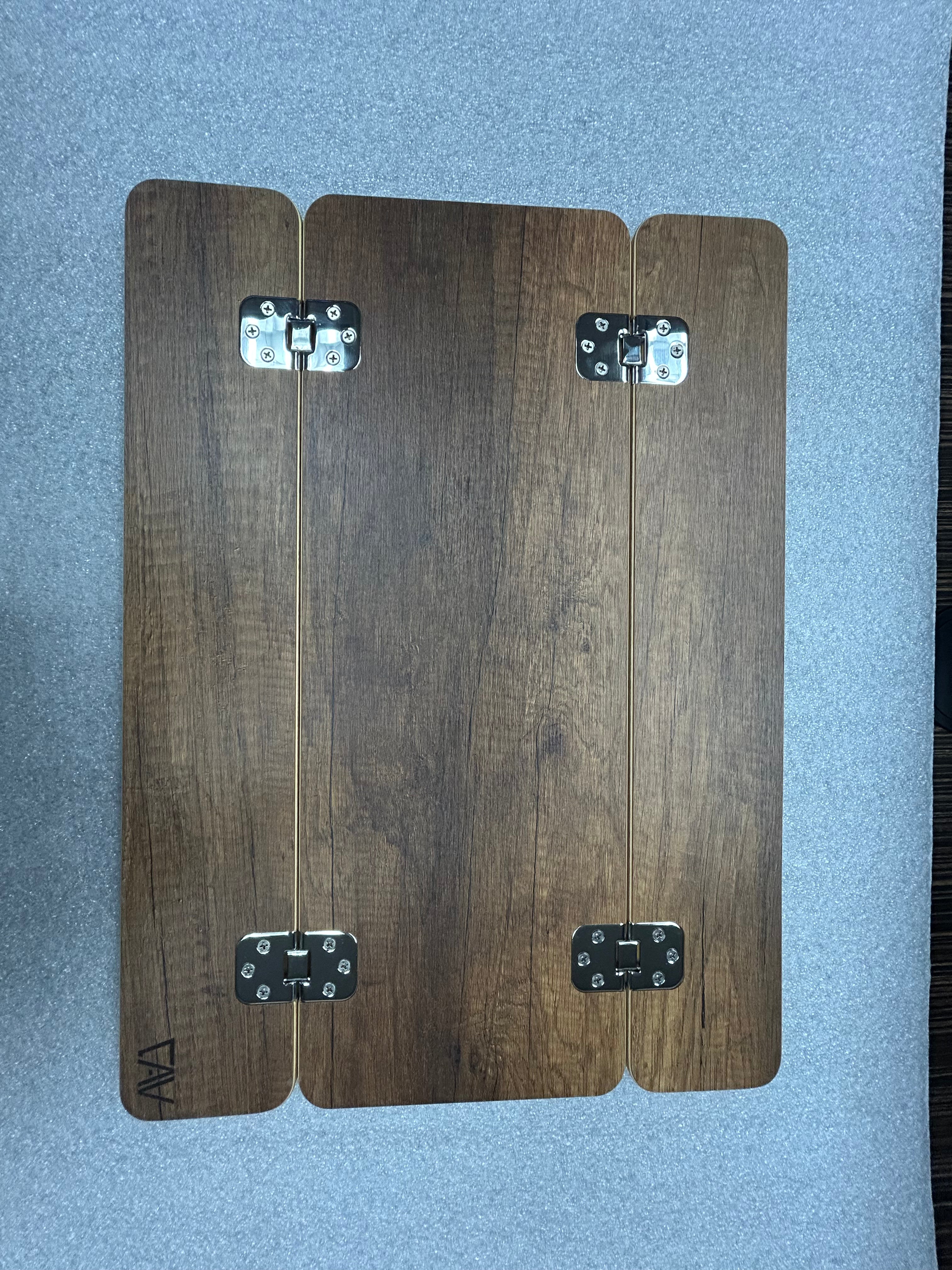 Mini Skinny Folding Table Top in dark wood finish shown fully extended, lying flat on a carpeted surface.