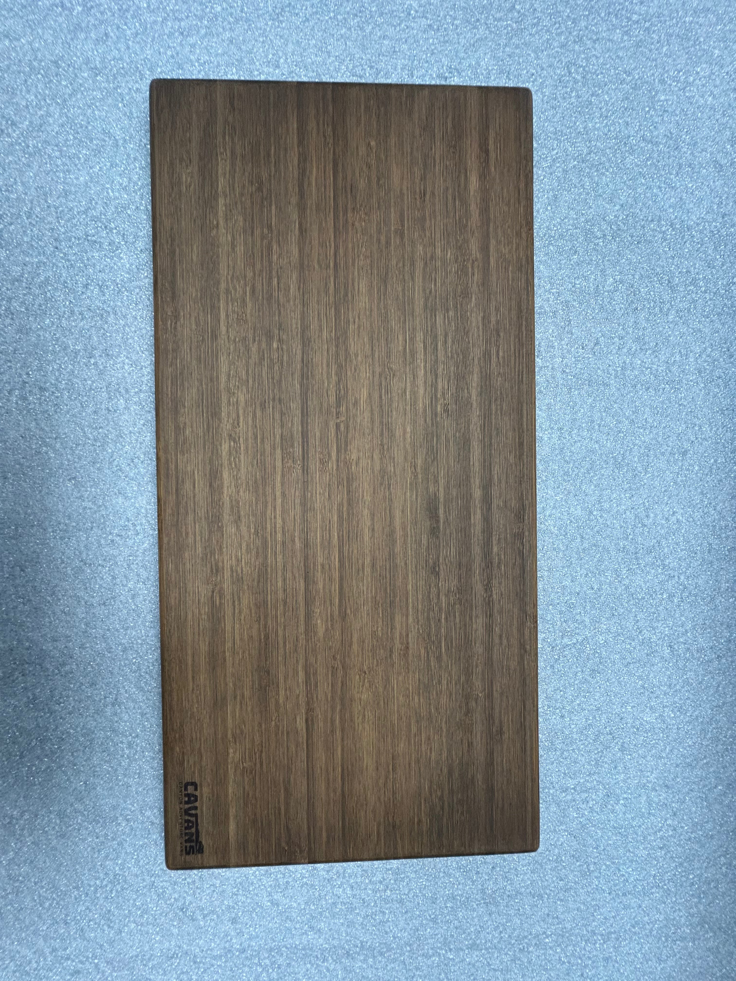 CAV small universal table top with woodgrain finish on a blue van surface