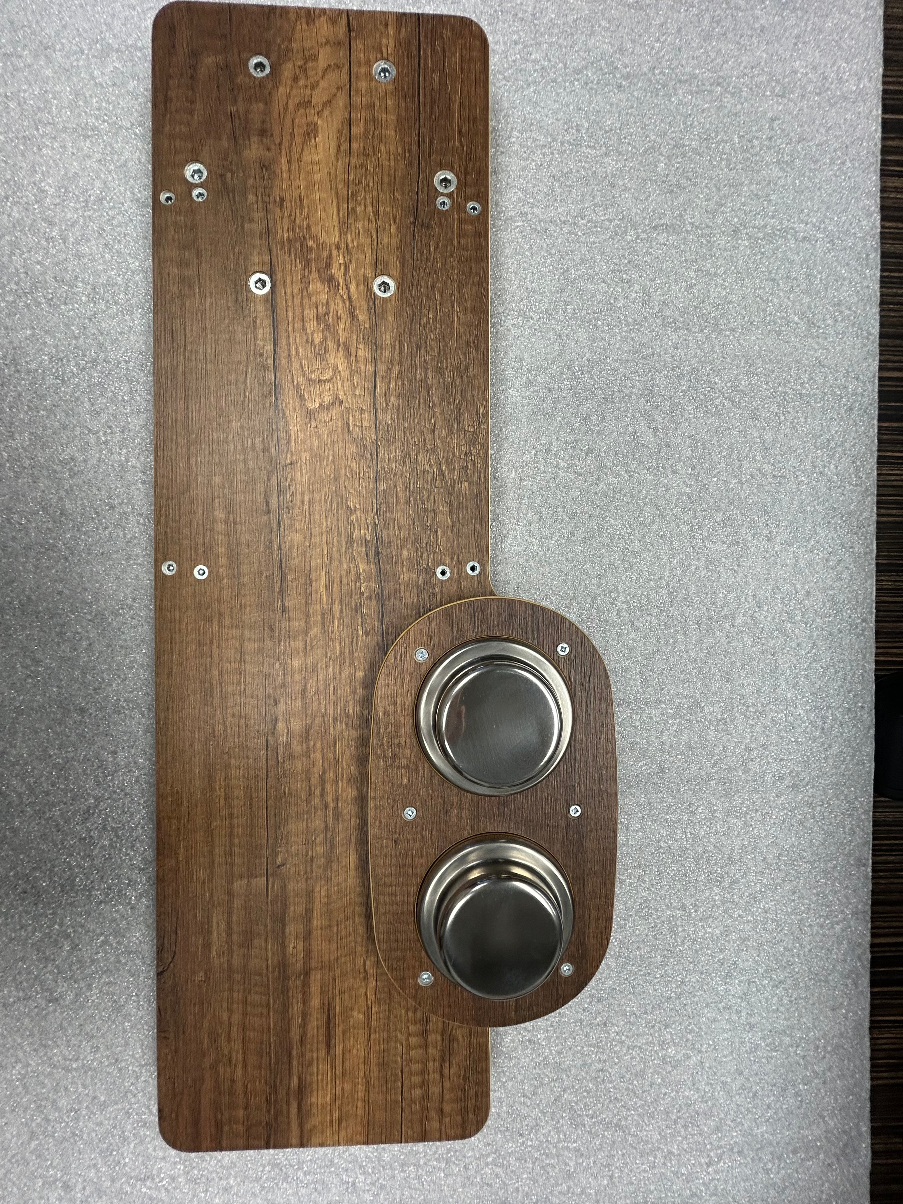 Skinny 2.0 folding wood table top with integrated dual metal cup holders, shown on flat surface.